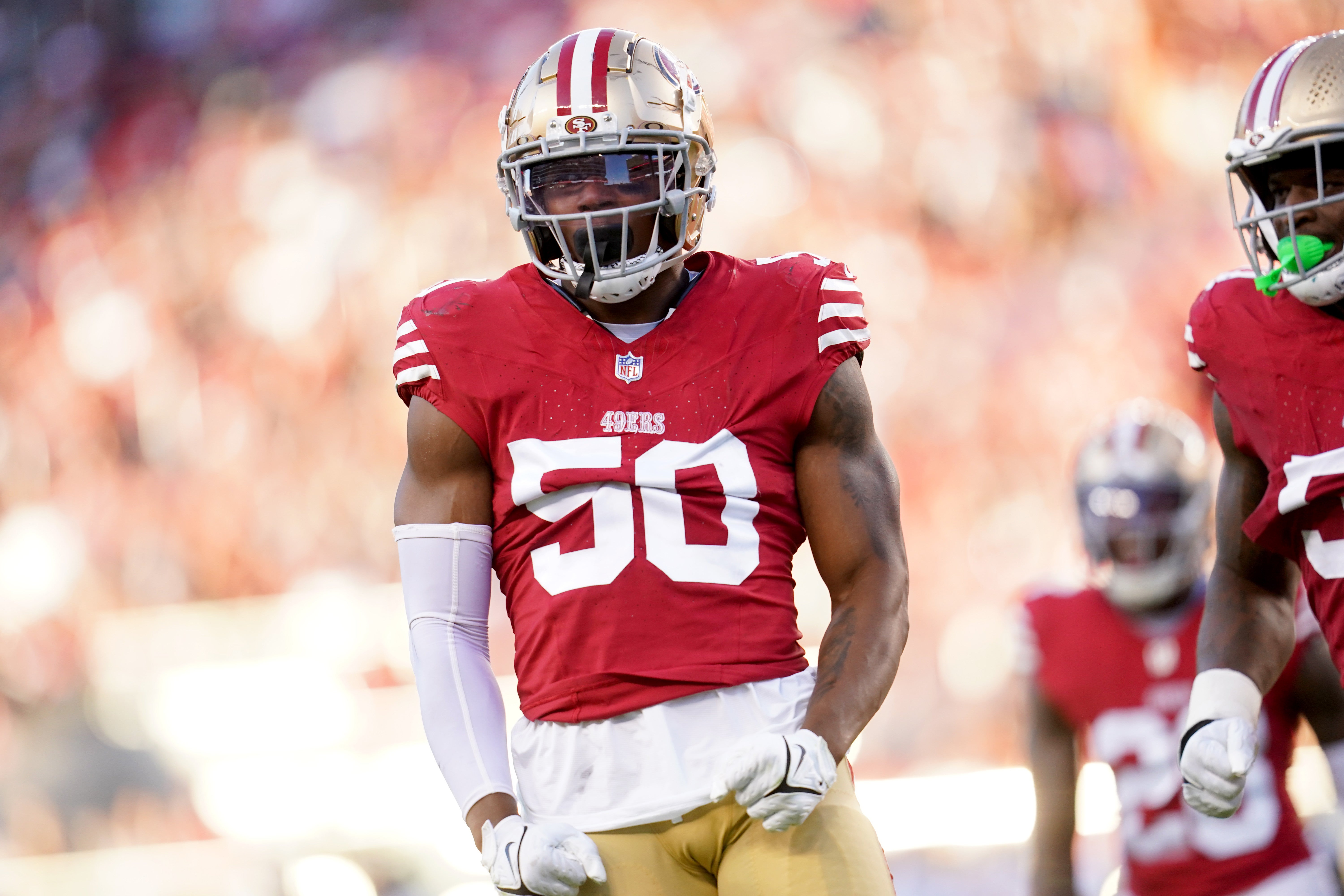 San Francisco 49ers linebacker Jalen Graham (50) reacts after recording a sack against the New Orleans Saints in the third quarter at Levi's Stadium.