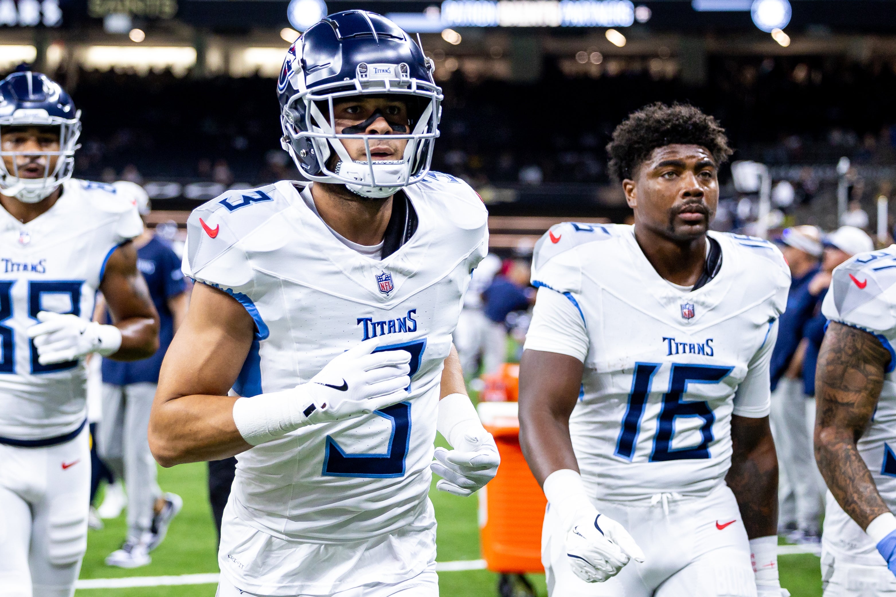 Tennessee Titans cornerback Caleb Farley (3) and wide receiver Treylon Burks (16) during the warmups before the game against the New Orleans Saints at Caesars Superdome. Stephen Lew-Imagn Images