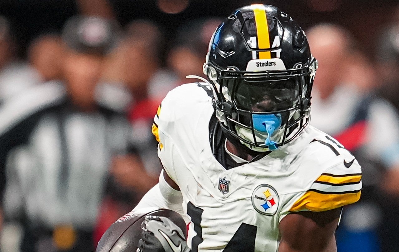 Sep 8, 2024; Atlanta, Georgia, USA; Pittsburgh Steelers wide receiver George Pickens (14) runs against the Atlanta Falcons after a catch at Mercedes-Benz Stadium.