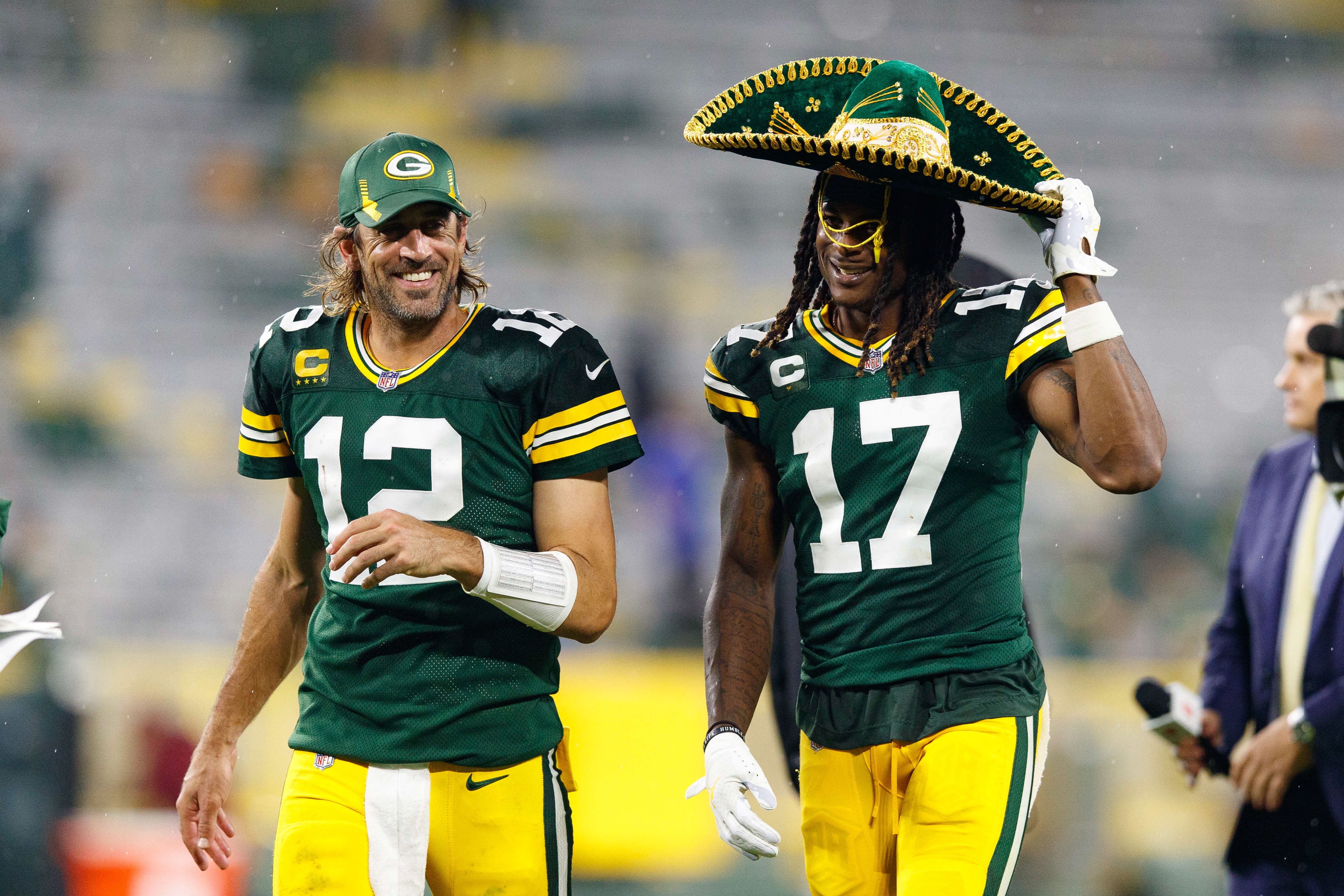 Green Bay Packers quarterback Aaron Rodgers (12) and wide receiver Davante Adams (17) following the game against the Detroit Lions at Lambeau Field.