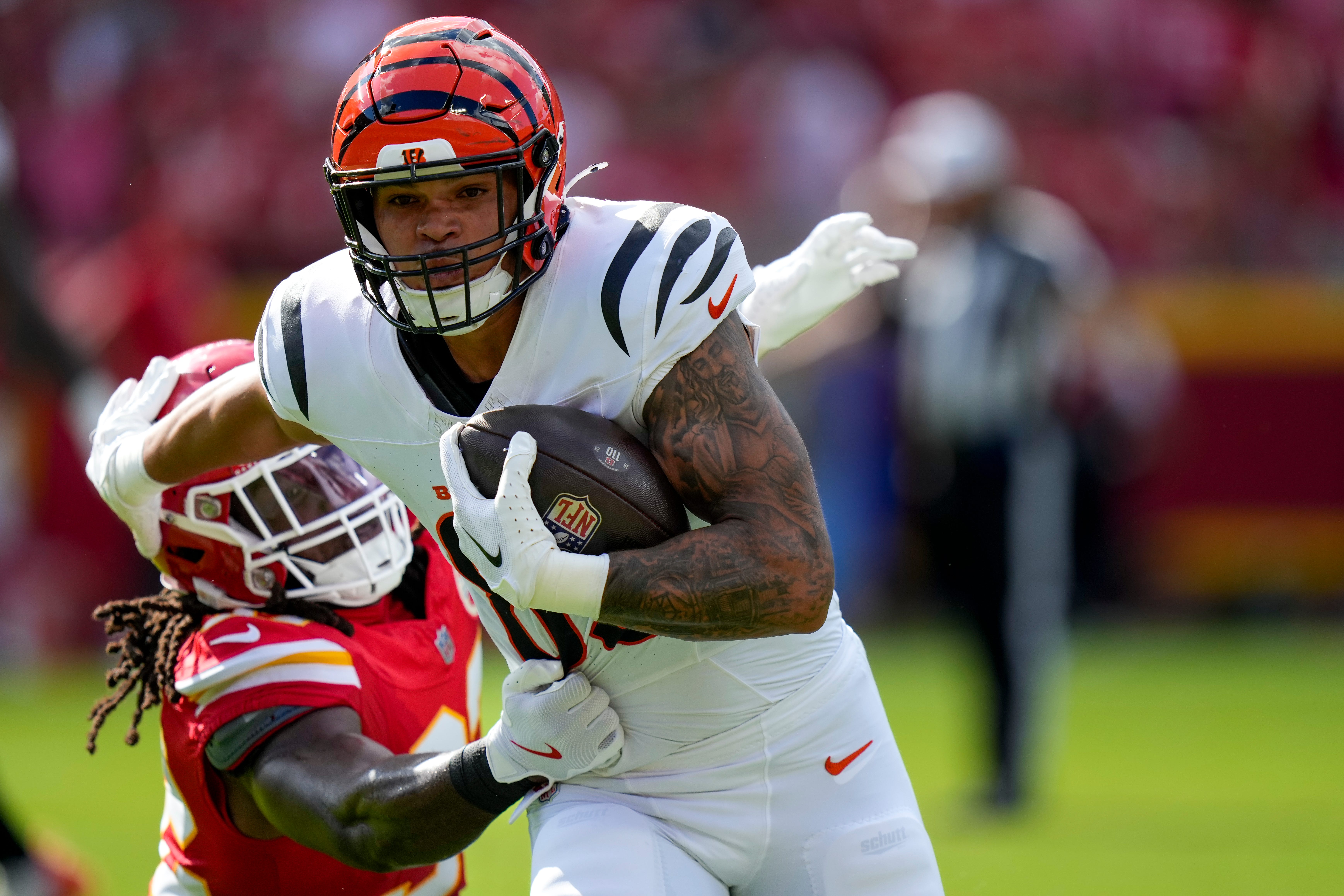 Cincinnati Bengals tight end Erick All Jr. (83) runs with a reception in the first quarter of the NFL Week 2 game between the Kansas City Chiefs and the Cincinnati Bengals at Arrowhead Stadium in Kansas City on Sunday, Sept. 15, 2024. The Bengals led 16-10 at halftime.  