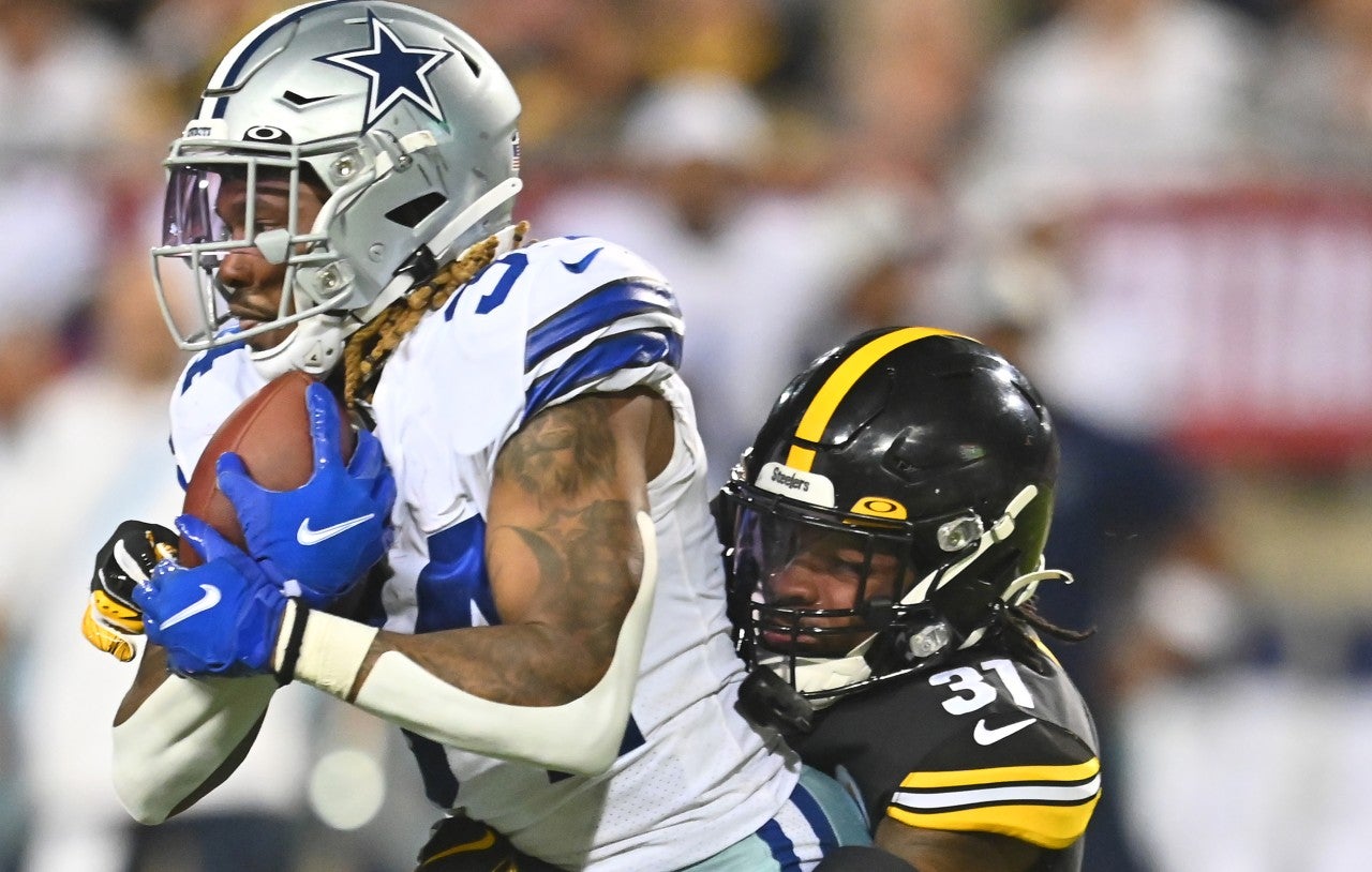 Aug 5, 2021; Canton, Ohio, USA; Pittsburgh Steelers cornerback Justin Layne (31) tackles Dallas Cowboys running back Rico Dowdle (34) during the first half at Tom Benson Hall of Fame Stadium.