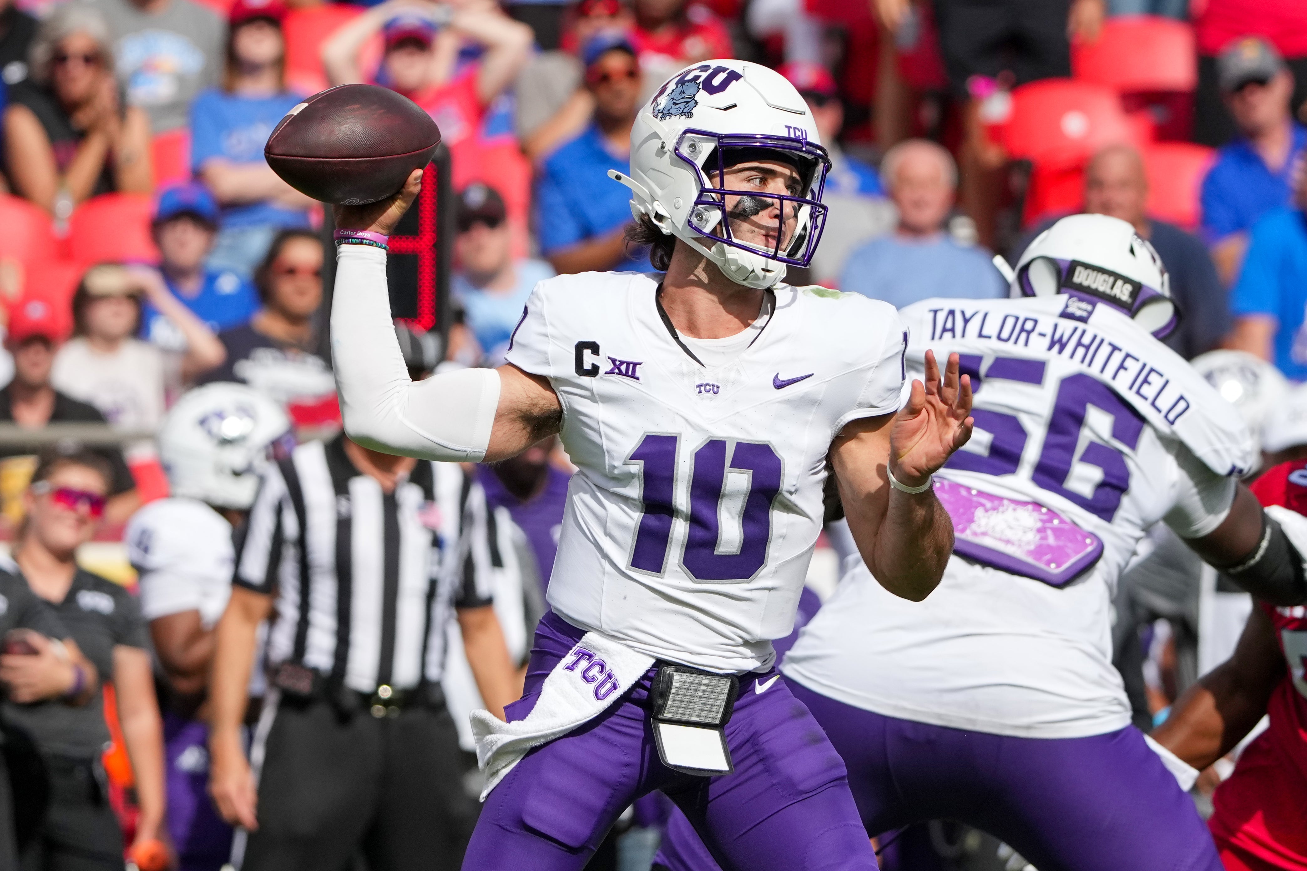 TCU Horned Frogs quarterback Josh Hoover (10) throws a pass against the Kansas Jayhawks during the first half at GEHA Field at Arrowhead Stadium.