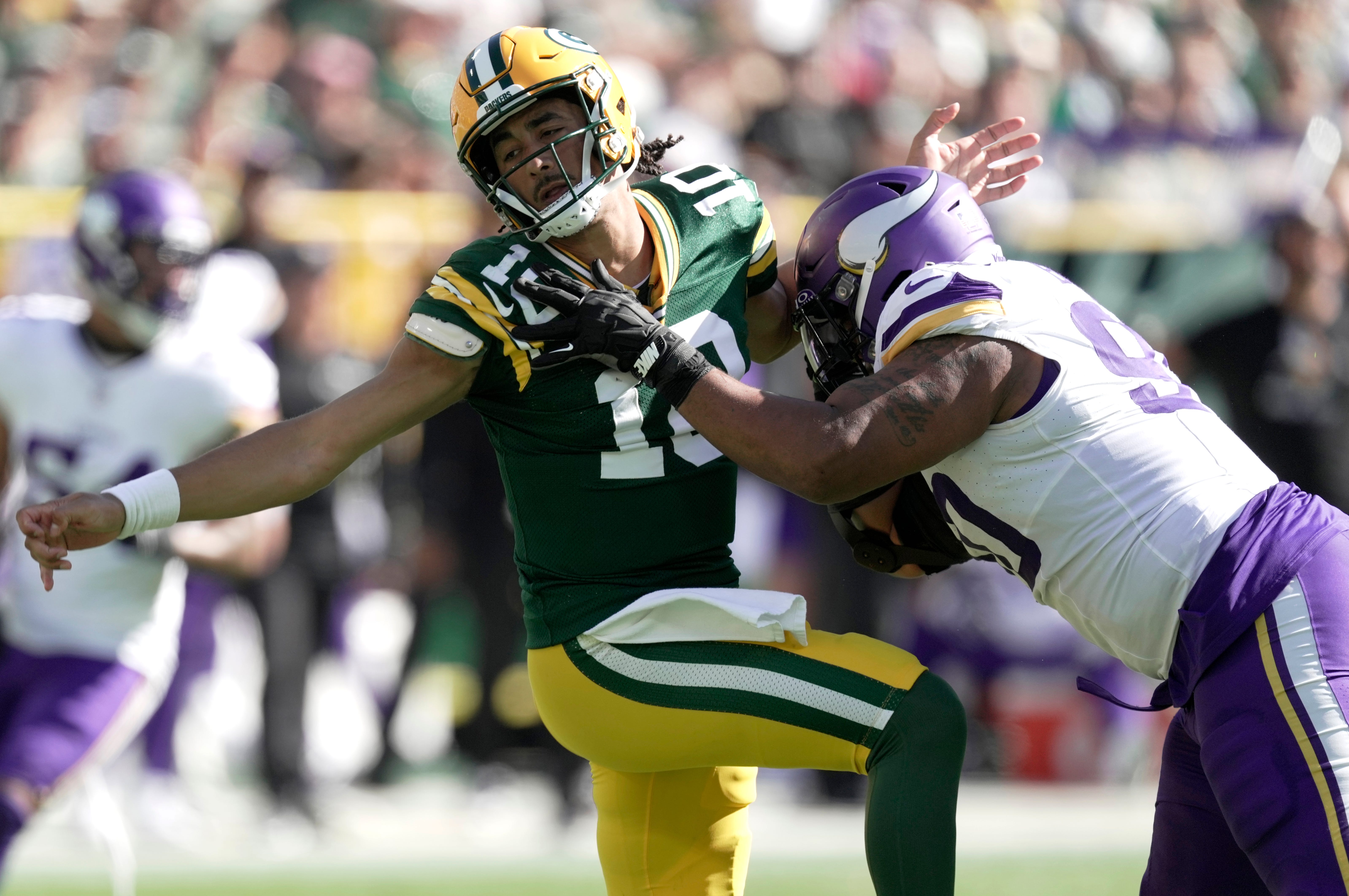 Minnesota Vikings defensive end Jonathan Bullard (90) pressures Green Bay Packers quarterback Jordan Love (10) during the third quarter of their game Sunday, September 29, 2024 at Lambeau Field in Green Bay, Wisconsin. The Minnesota Vikings beat the Green Bay Packers 31-29.