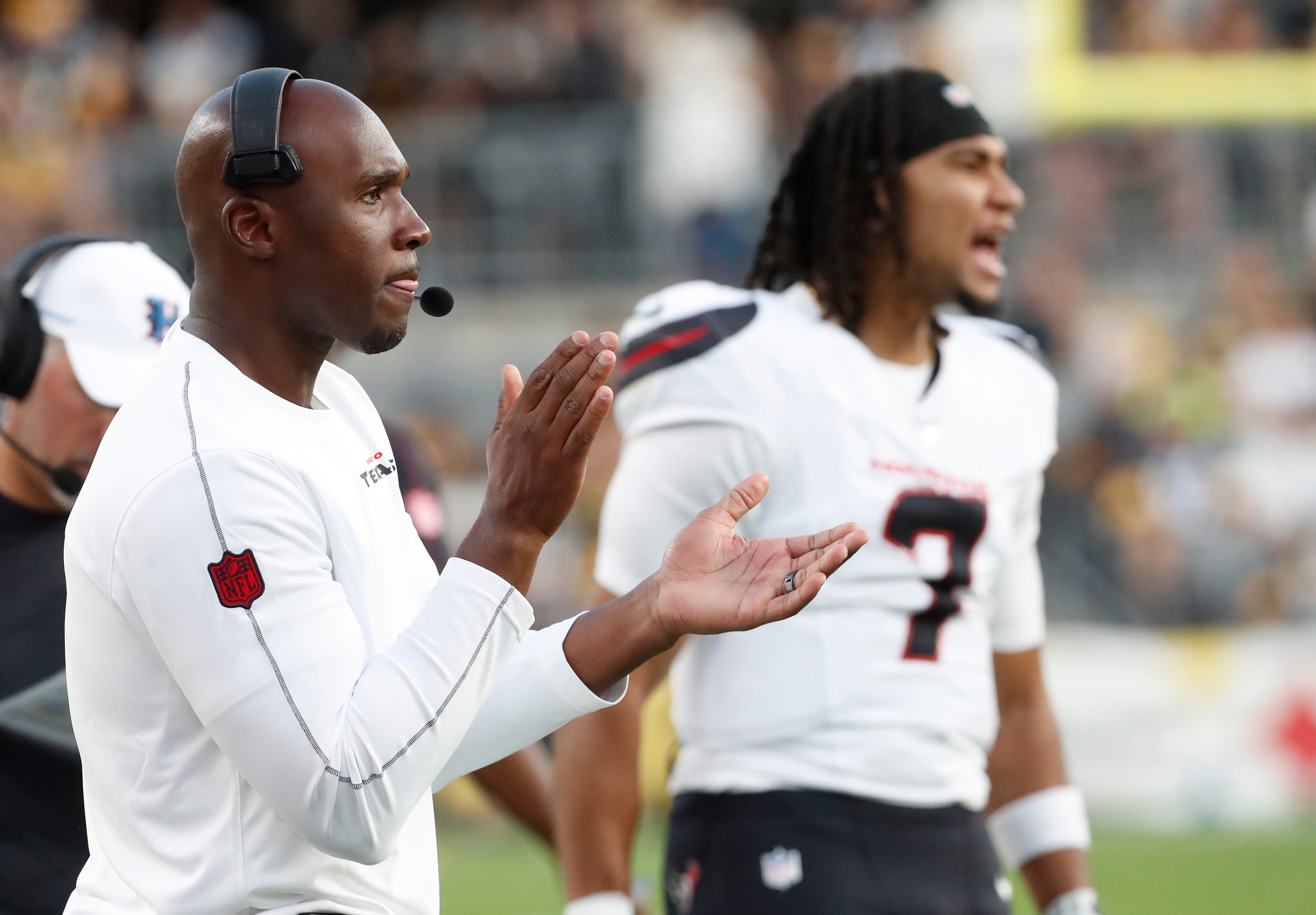 Aug 9, 2024; Pittsburgh, Pennsylvania, USA; Houston Texans head coach DeMeco Ryans (left) reacts after a Texans touchdown against the Pittsburgh Steelers during the second quarter at Acrisure Stadium.