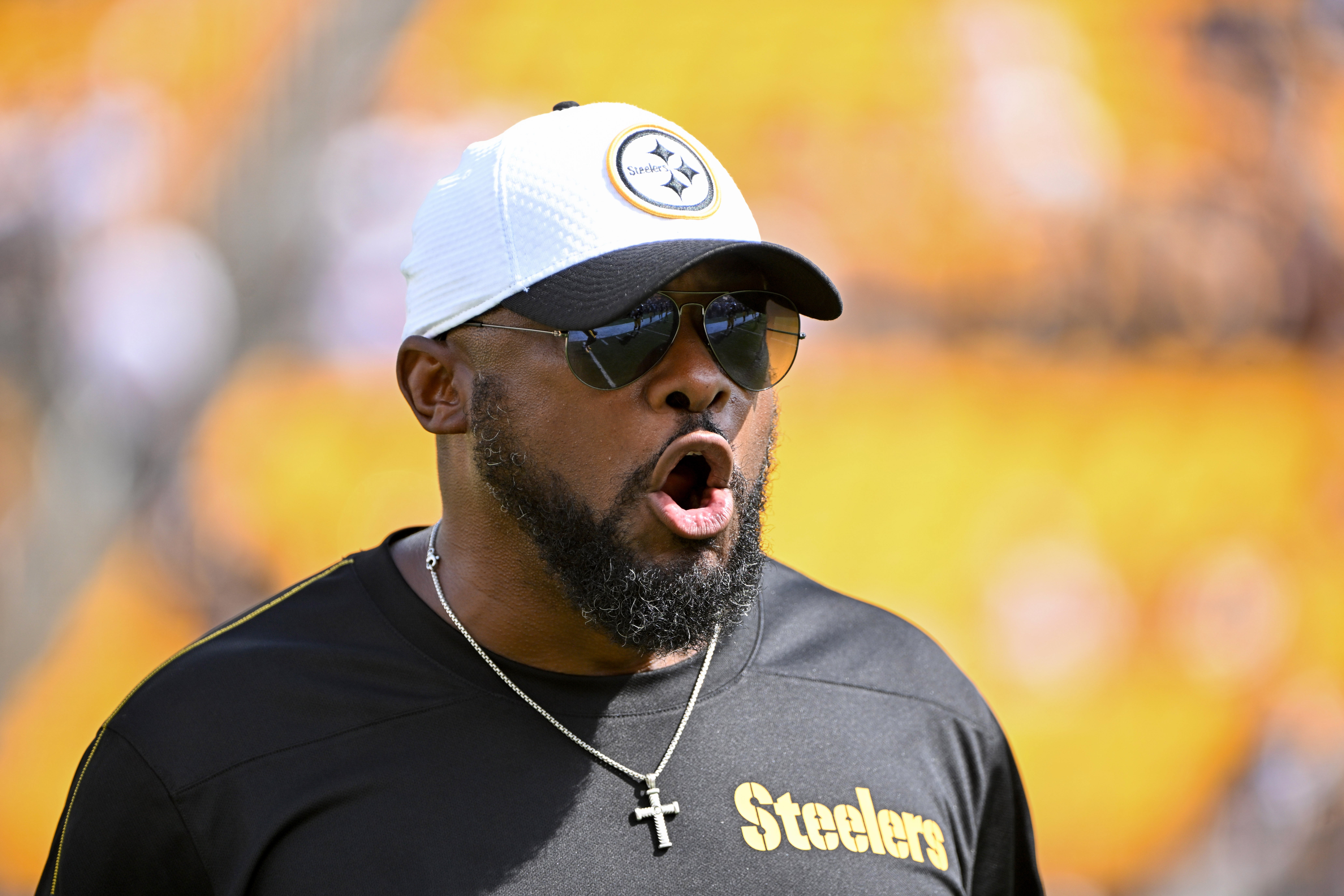 Pittsburgh Steelers head coach Mike Tomlin watches warmups for a game against the Los Angeles Chargers at Acrisure Stadium.