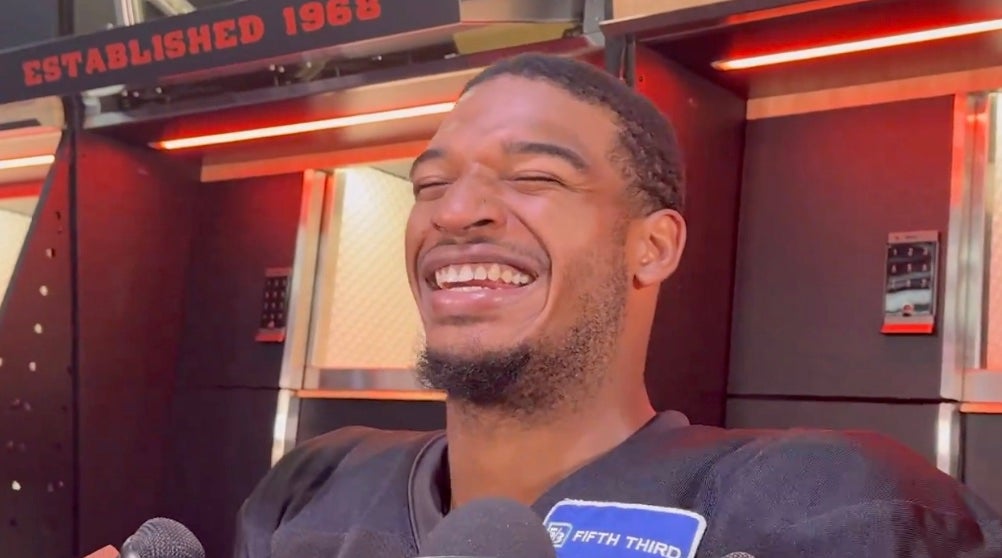 Cincinnati Bengals wide receiver Ja'Marr Chase laughs while talking to reporters on Thursday, October 3, 2024.