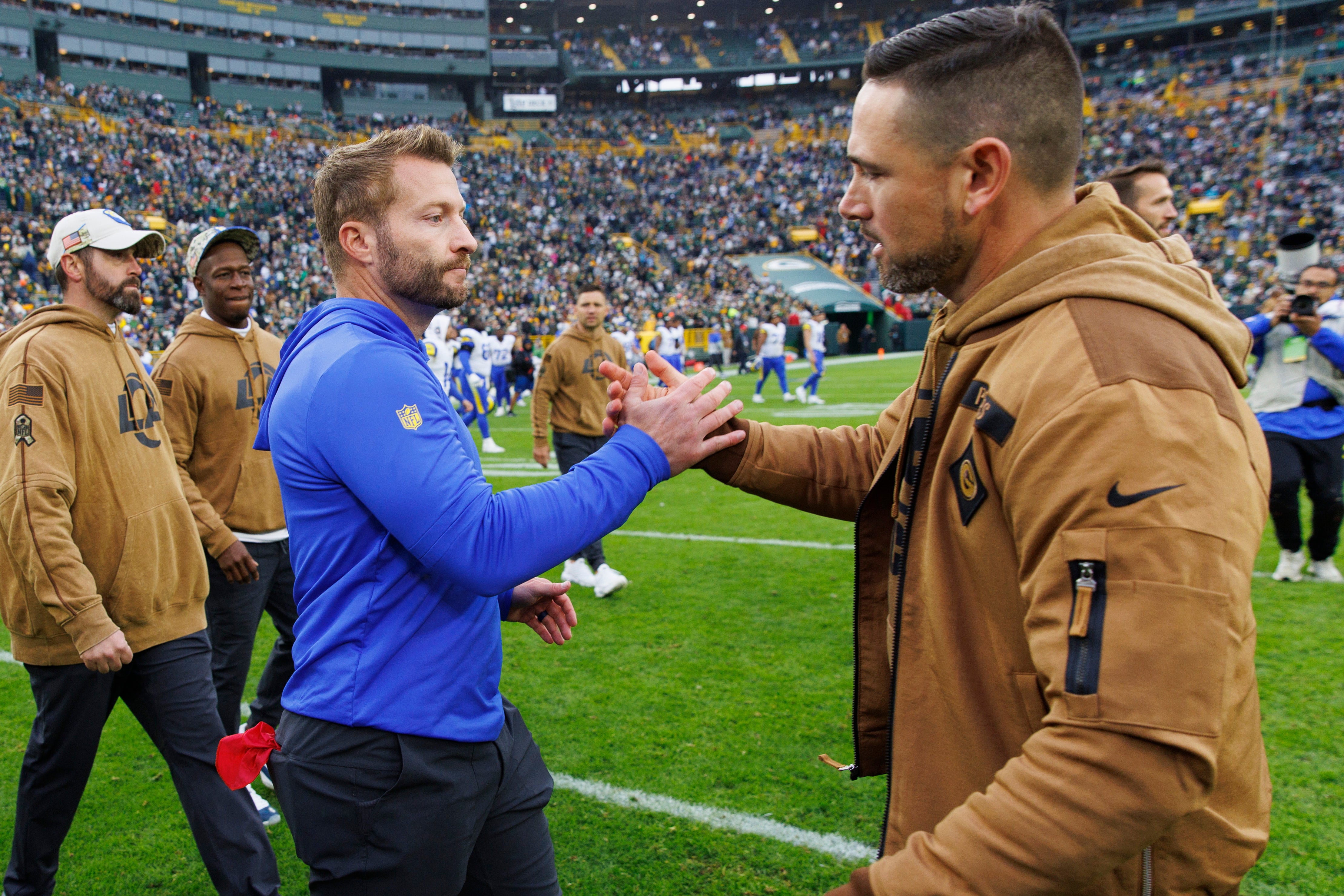 Los Angeles Rams head coach Sean McVay greets Green Bay Packers head coach Matt LaFleur following the game at Lambeau Field.