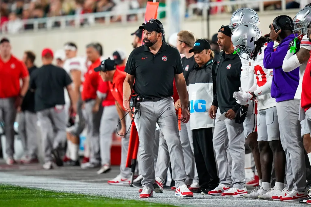 Ohio State Buckeyes head coach Ryan Day watches his players in the first half at Spartan Stadium on Saturday