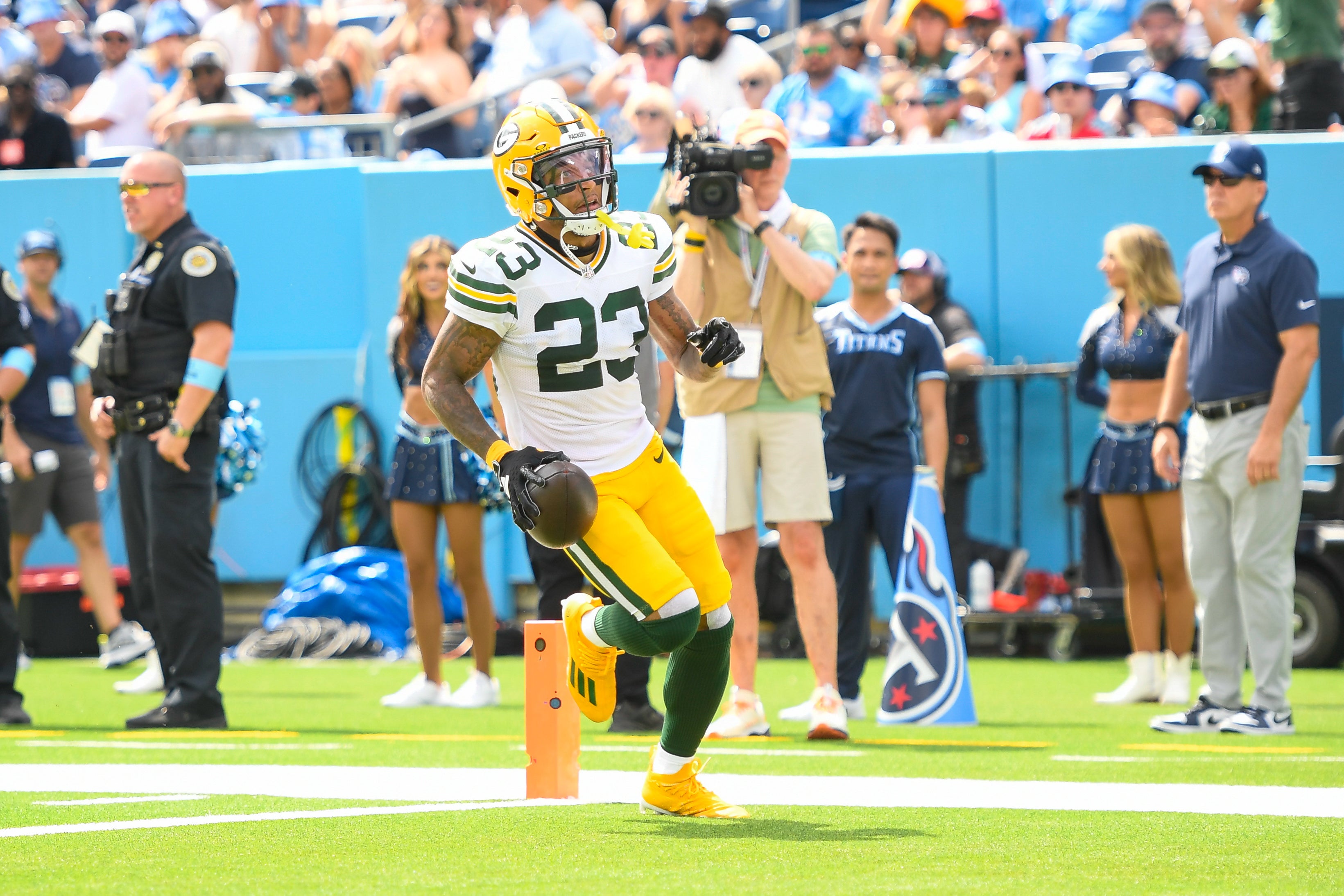 Green Bay Packers cornerback Jaire Alexander (23) scores on a pick six thrown by Tennessee Titans Will Levis (8) during the first half at Nissan Stadium. 