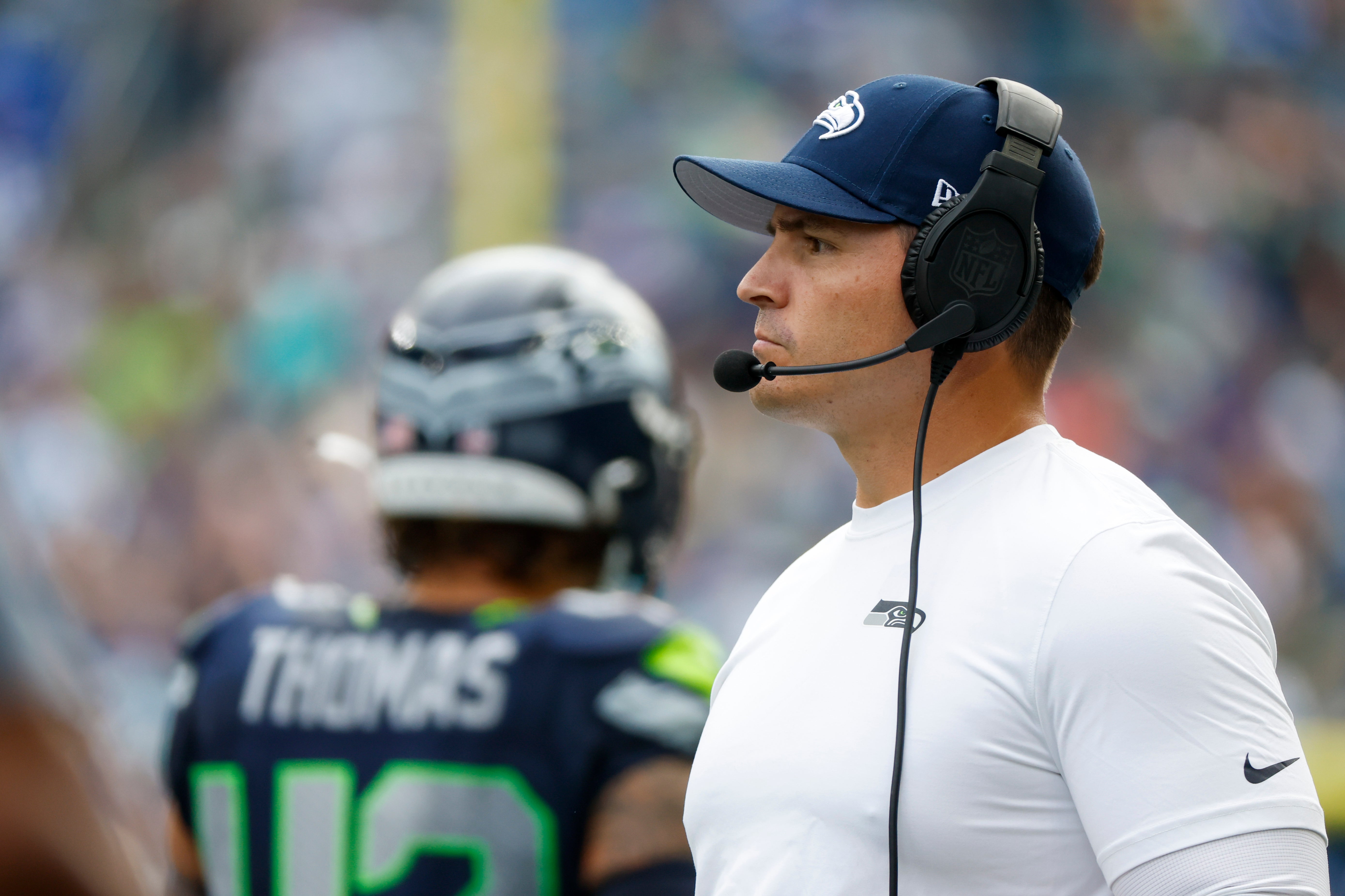 Seattle Seahawks head coach Mike Macdonald stands on the sideline during the third quarter against the Miami Dolphins at Lumen Field.