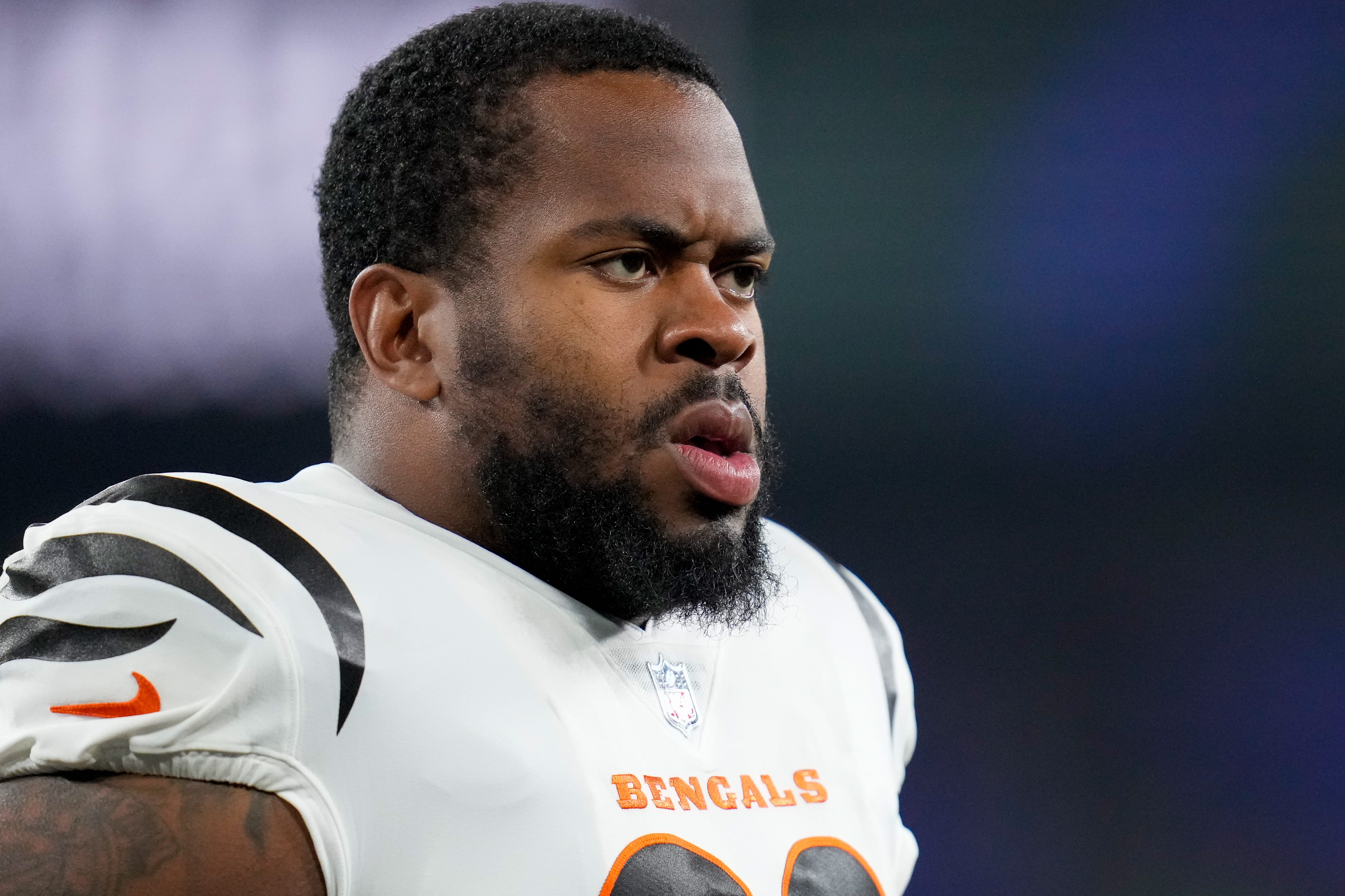 Cincinnati Bengals defensive tackle BJ Hill (92) stretches during warmups before the first quarter of the NFL Week 11 game between the Baltimore Ravens and the Cincinnati Bengals at M&T Bank Stadium in Baltimore on Thursday, Nov. 16, 2023.