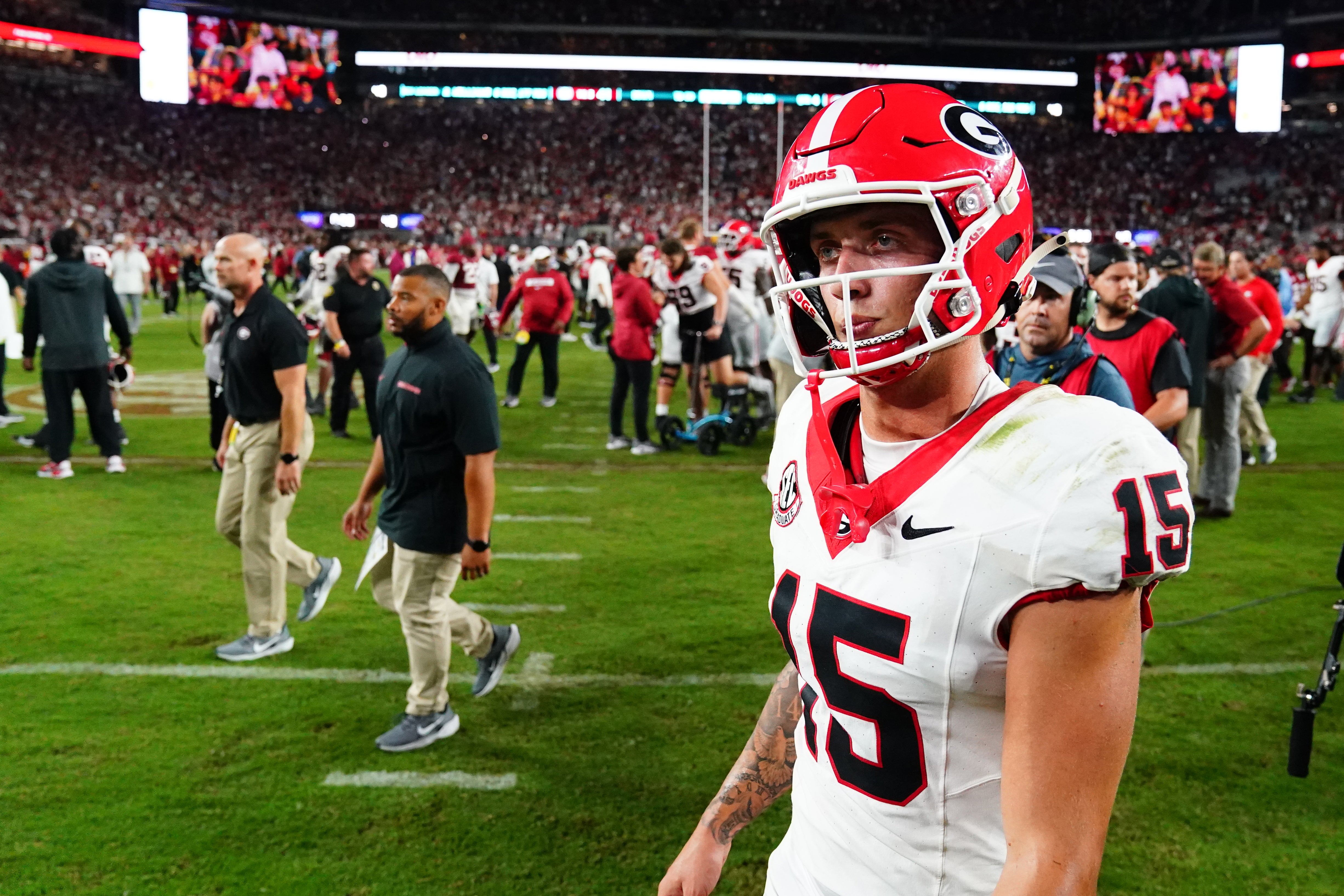 Sep 28, 2024; Tuscaloosa, Alabama, USA; Georgia Bulldogs quarterback Carson Beck (15) leaves the field after a loss to the Alabama Crimson Tide at Bryant-Denny Stadium.