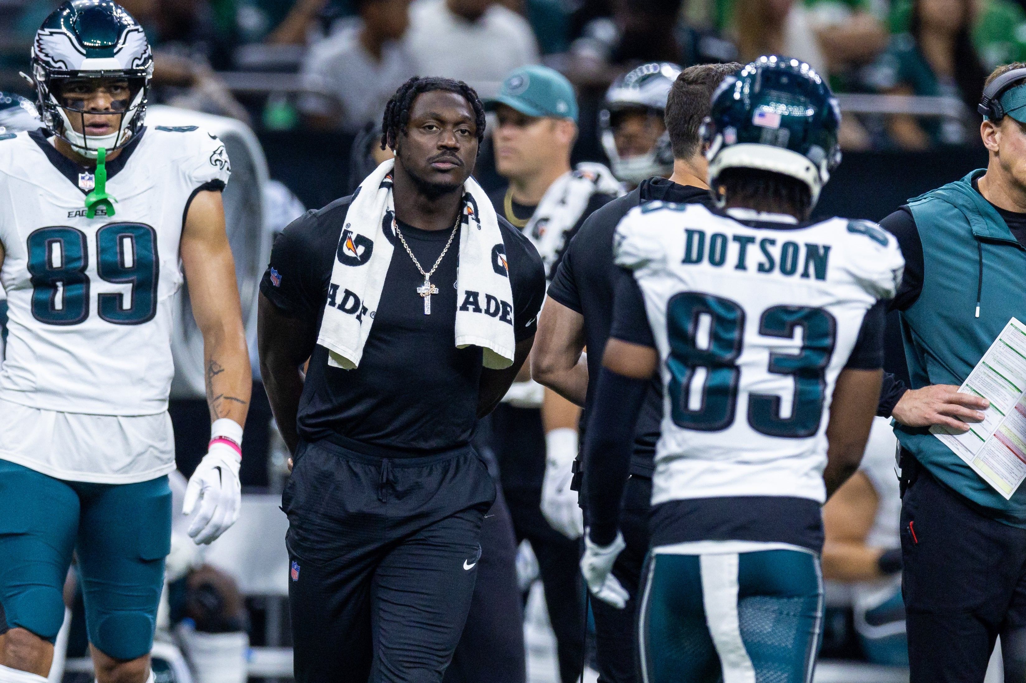 Philadelphia Eagles wide receiver A.J. Brown (11) in street clothes due to injury looks on against the New Orleans Saints during the first half at Caesars Superdome.