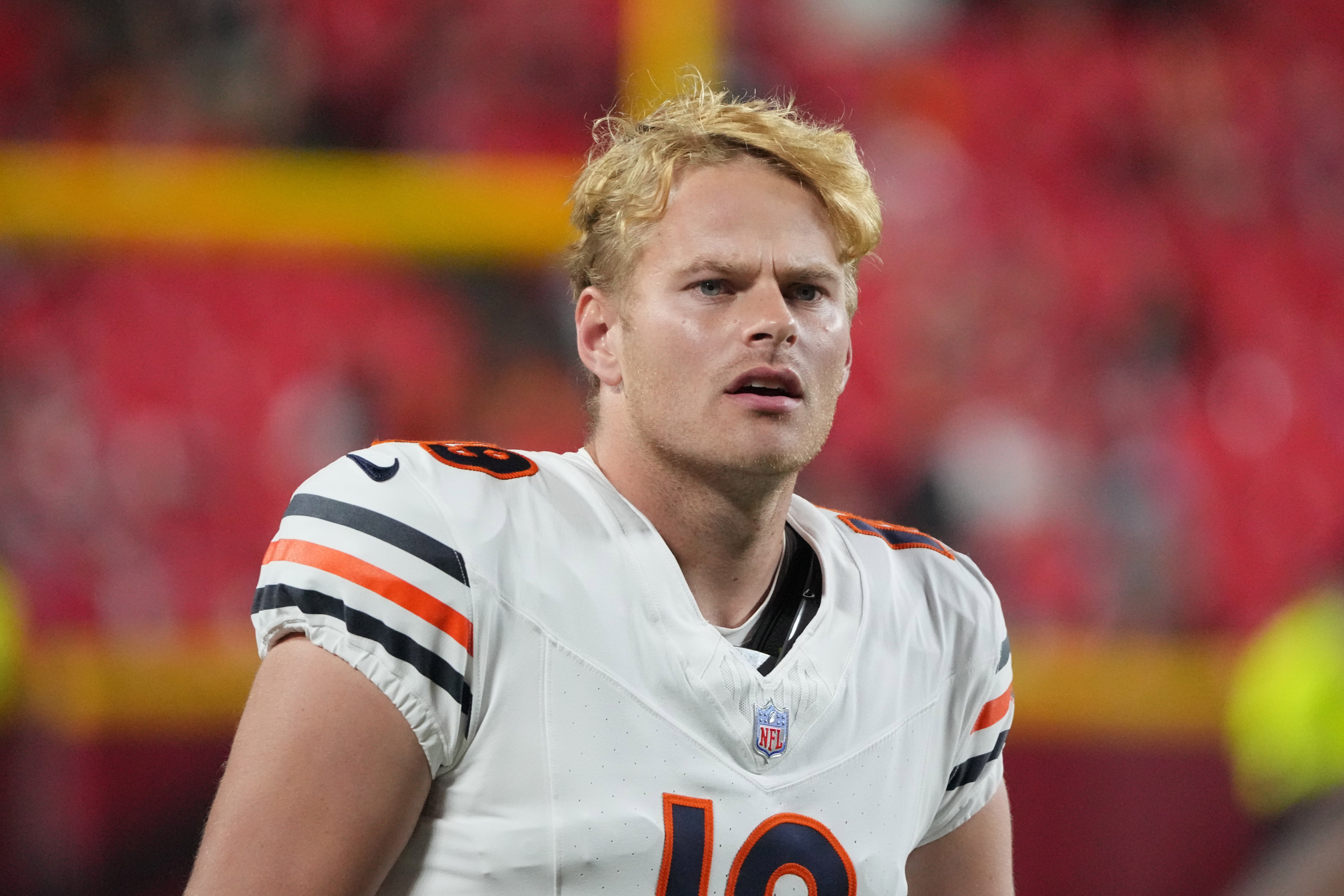 Aug 22, 2024; Kansas City, Missouri, USA; Chicago Bears punter Tory Taylor (19) on the sidelines against the Kansas City Chiefs during the game at GEHA Field at Arrowhead Stadium.