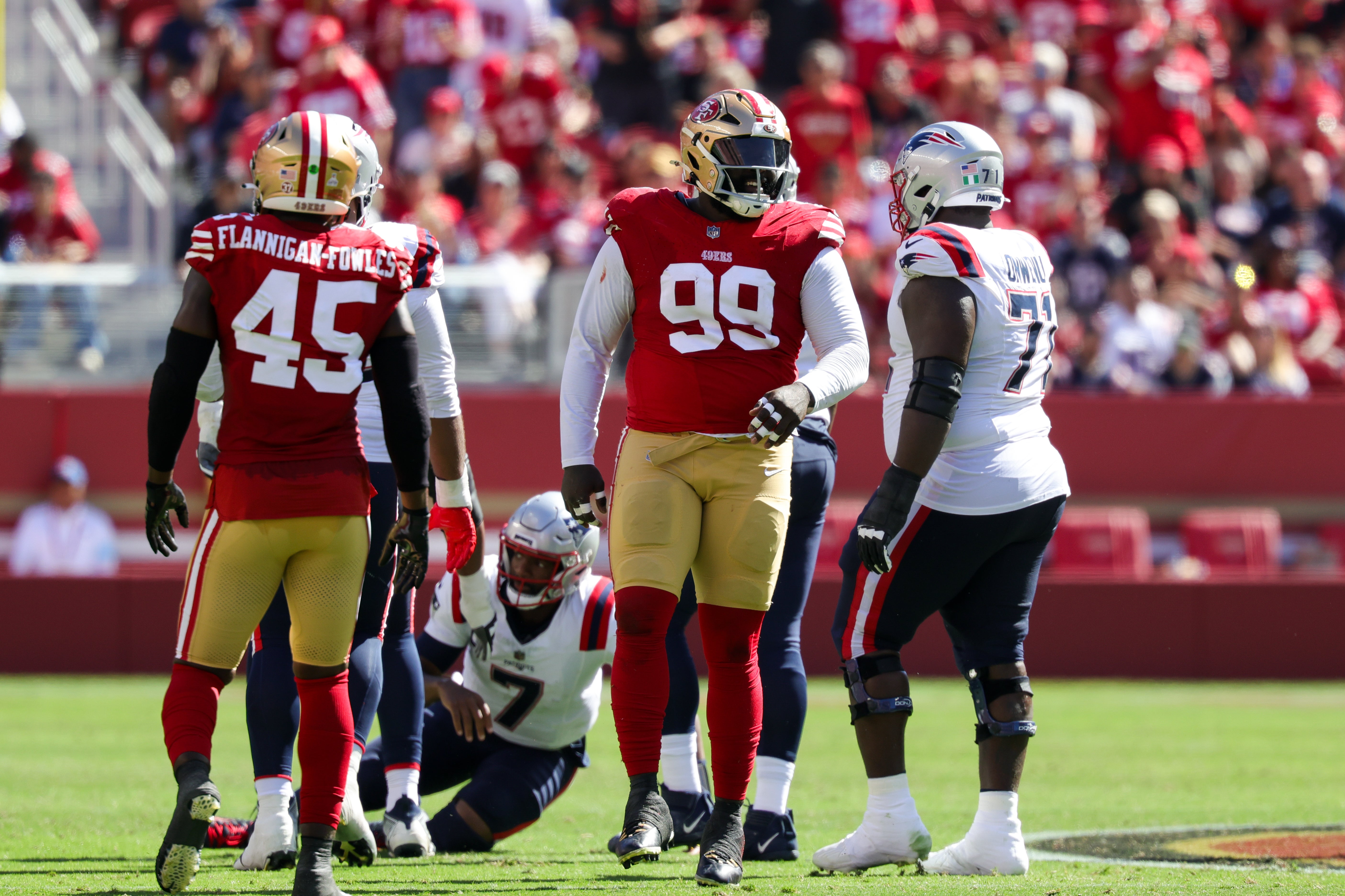 San Francisco 49ers defensive tackle Maliek Collins (99) celebrates after a tackle during the second quarter against the New England Patriots at Levi's Stadium.
