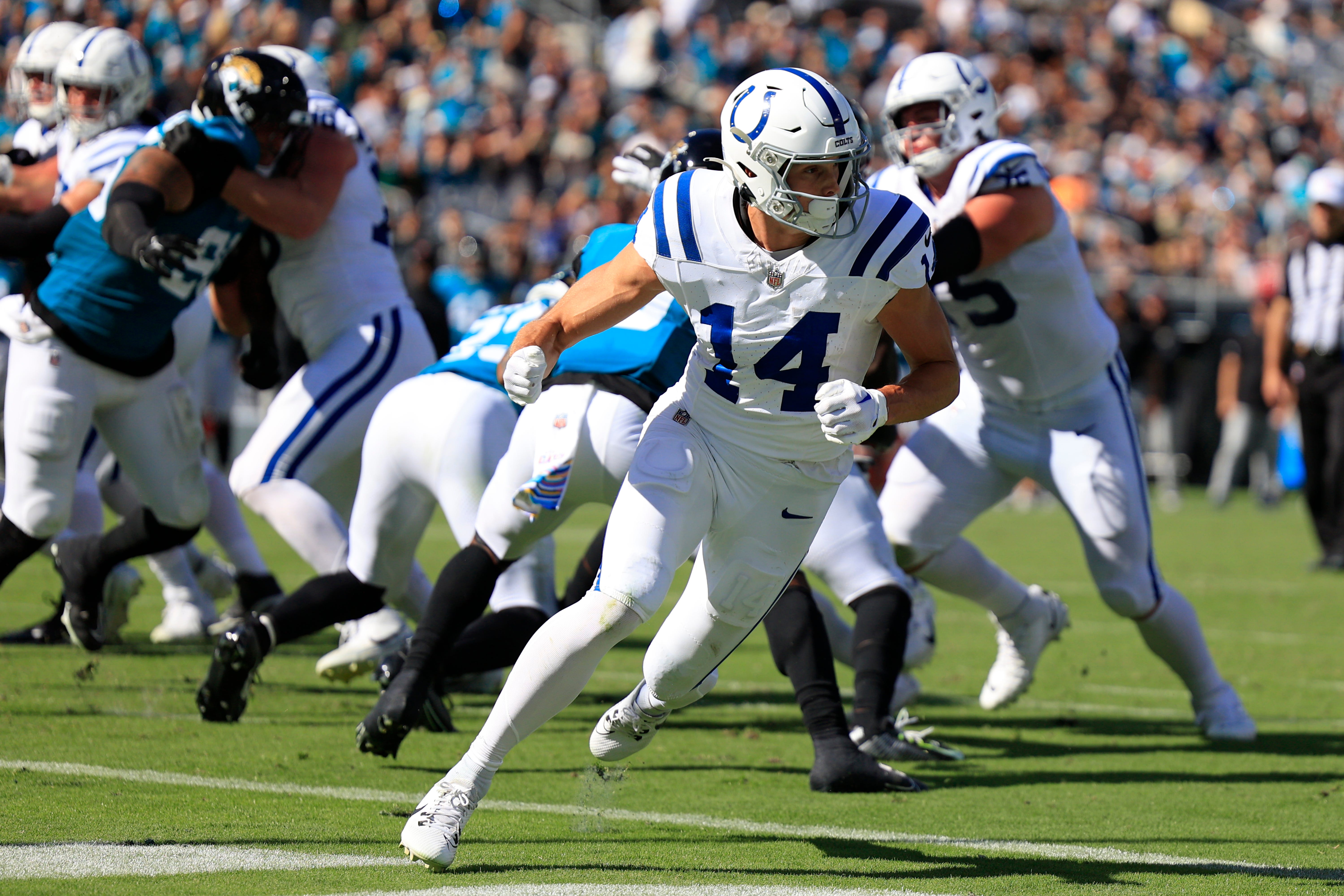 Indianapolis Colts wide receiver Alec Pierce (14) runs his route during the fourth quarter of an NFL football matchup Sunday, Oct. 15, 2023 at EverBank Stadium in Jacksonville, Fla. The Jacksonville Jaguars defeated the Indianapolis Colts 37-20.