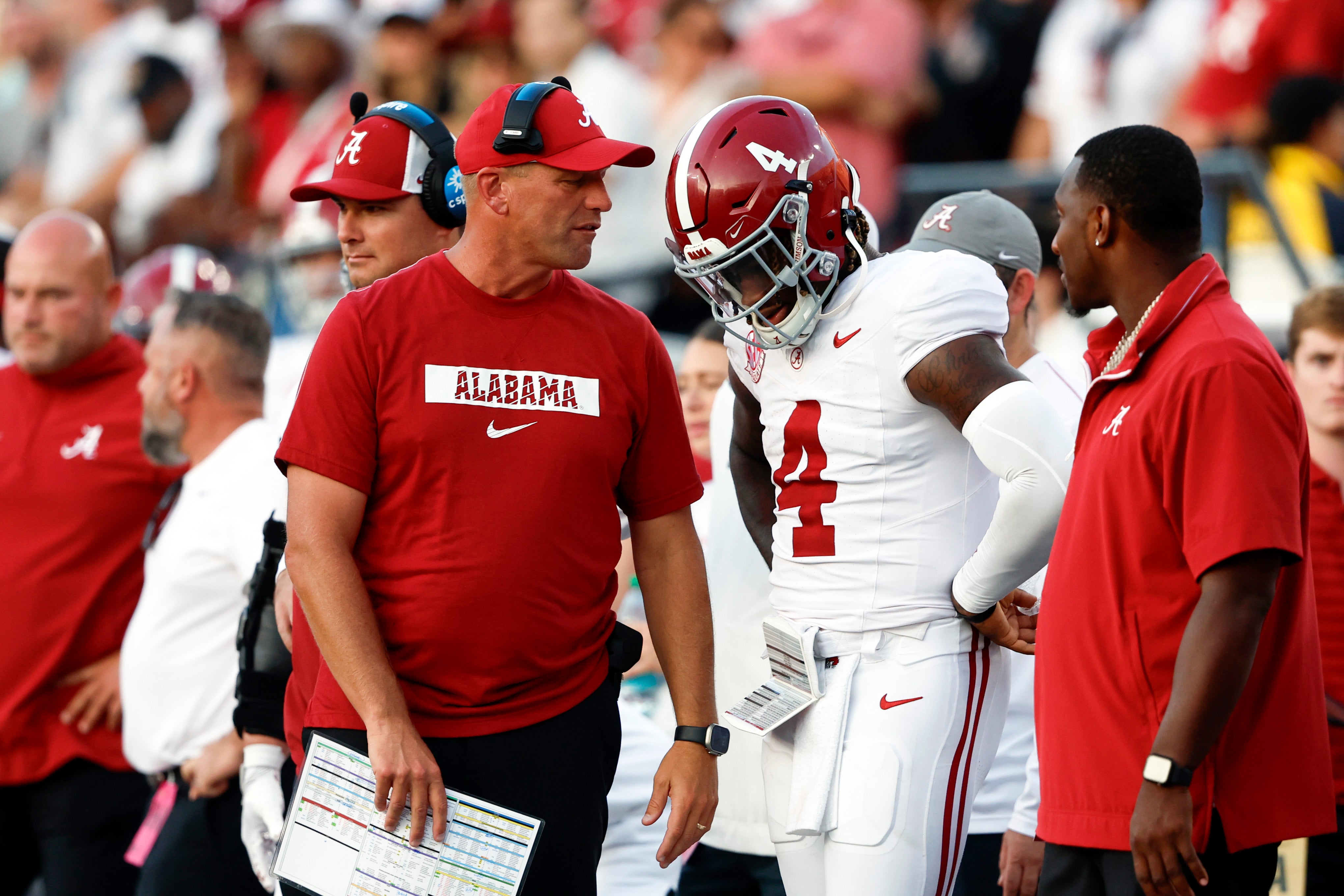 Oct 5, 2024; Nashville, Tennessee, USA; Alabama Crimson Tide head coach Kalen DeBoer talks with quarterback Jalen Milroe (4) during the second half against the Vanderbilt Commodores at FirstBank Stadium.