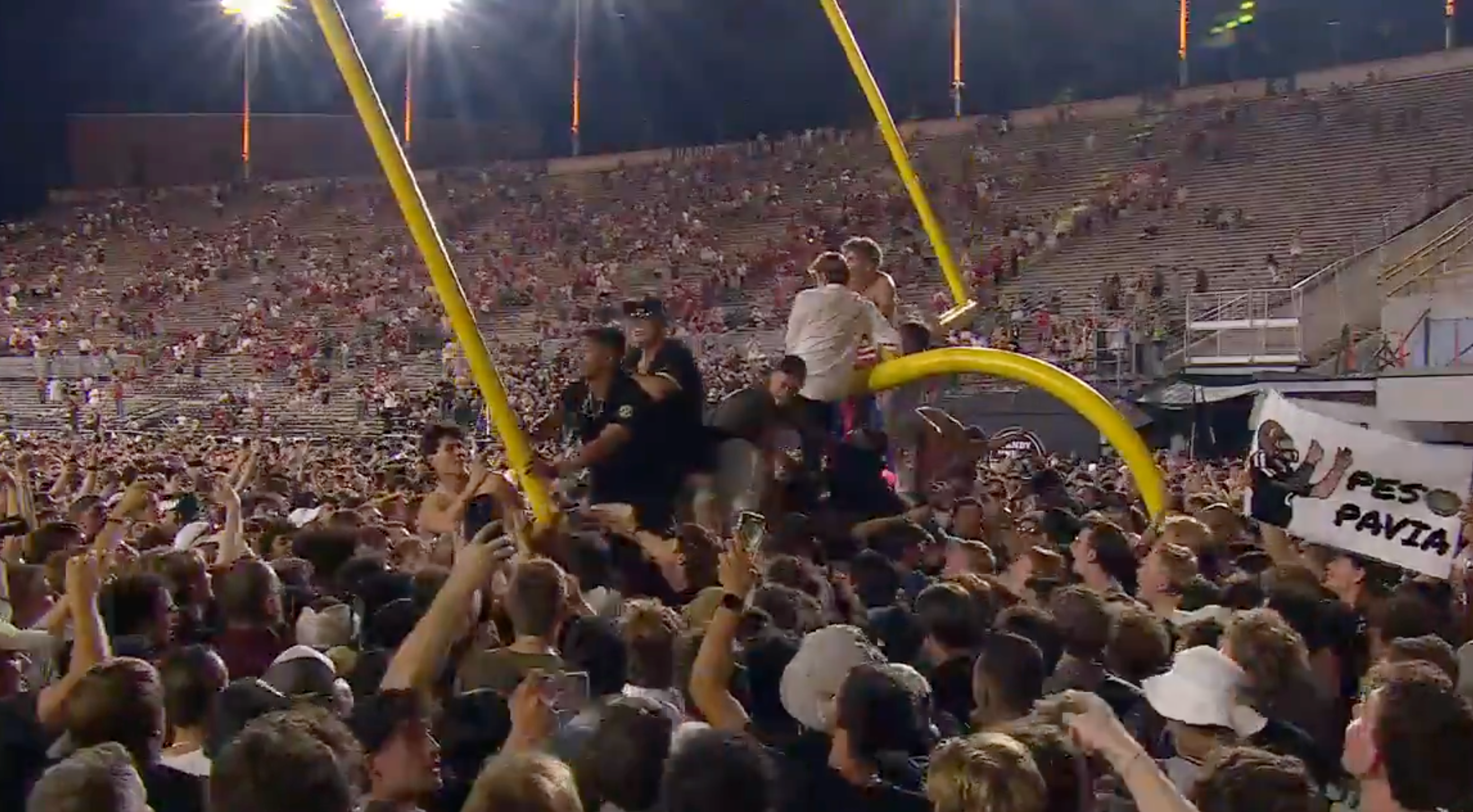 Vanderbilt fans tear down the goal posts after defeating Alabama 40-35.