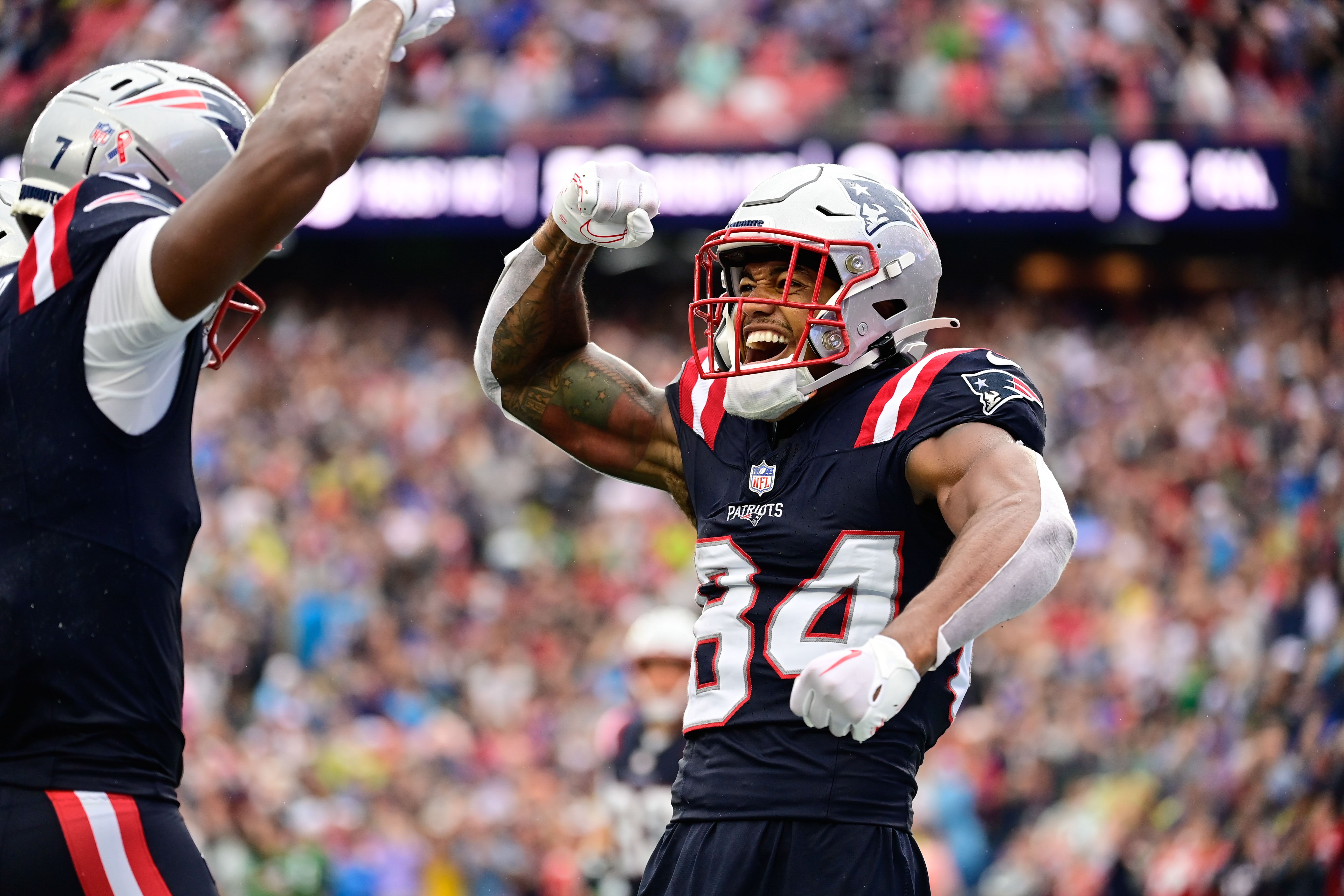 Sep 10, 2023; Foxborough, Massachusetts, USA; New England Patriots wide receiver Kendrick Bourne (84) celebrates his touchdown against the Philadelphia Eagles with wide receiver JuJu Smith-Schuster (7) during the first half at Gillette Stadium.