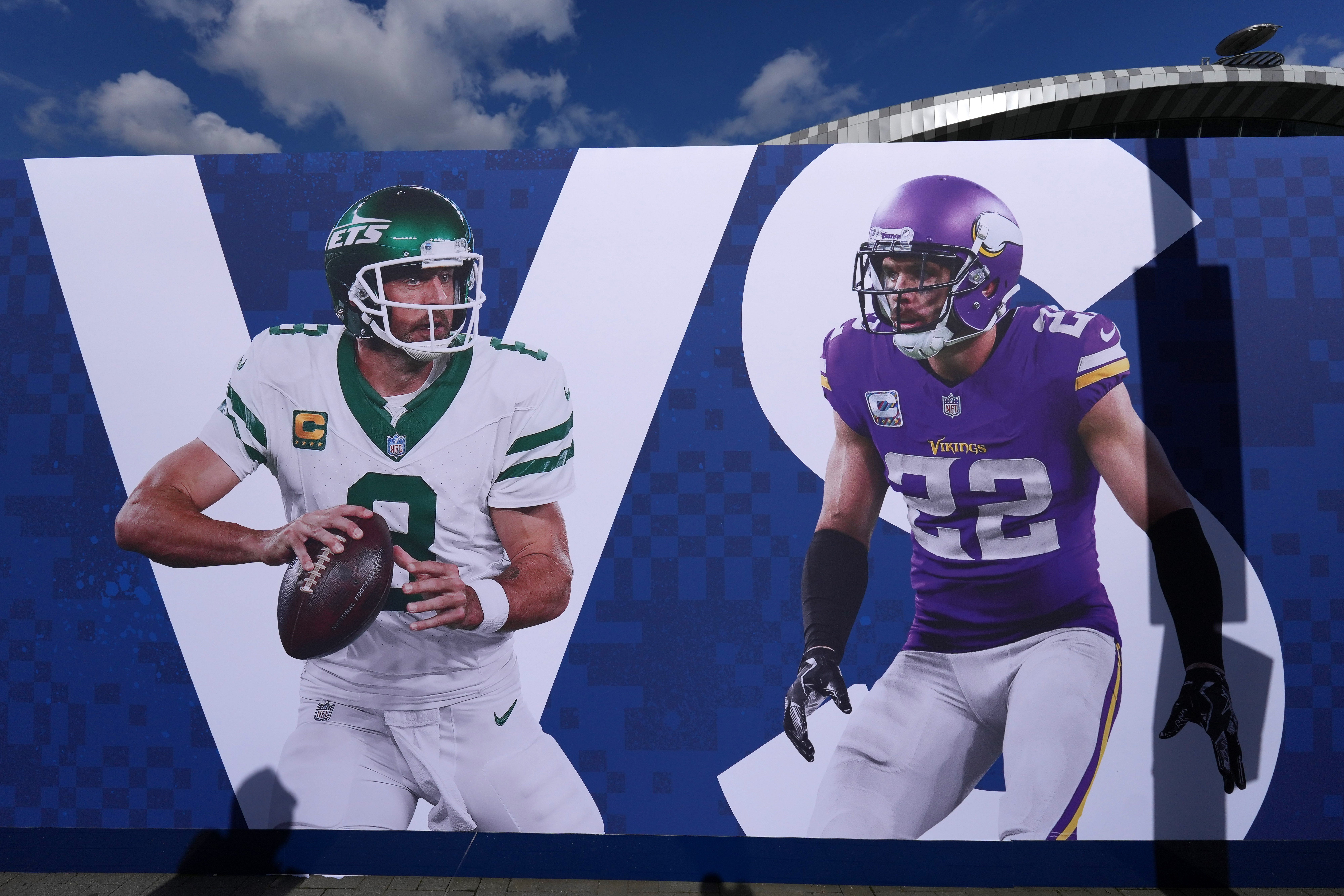 Oct 5, 2024; London, United Kingdom; A graphic featuring images of New York Jets quarterback Aaron Rodgers (8) and Minnesota Vikings safety Harrison Smith (22) at Tottenham Hotspur Stadium.