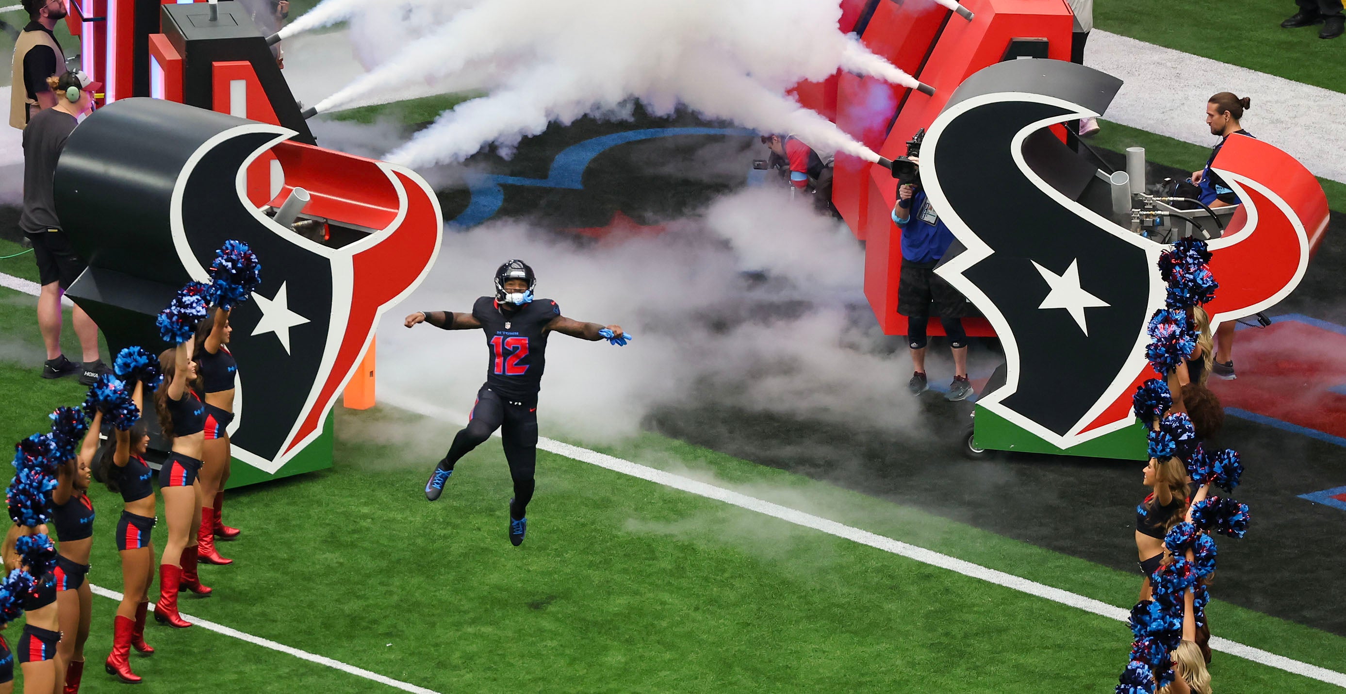 Oct 6, 2024; Houston, Texas, USA; Houston Texans wide receiver Nico Collins (12) is introduced before playing against the Houston Texans in the first quarter at NRG Stadium.