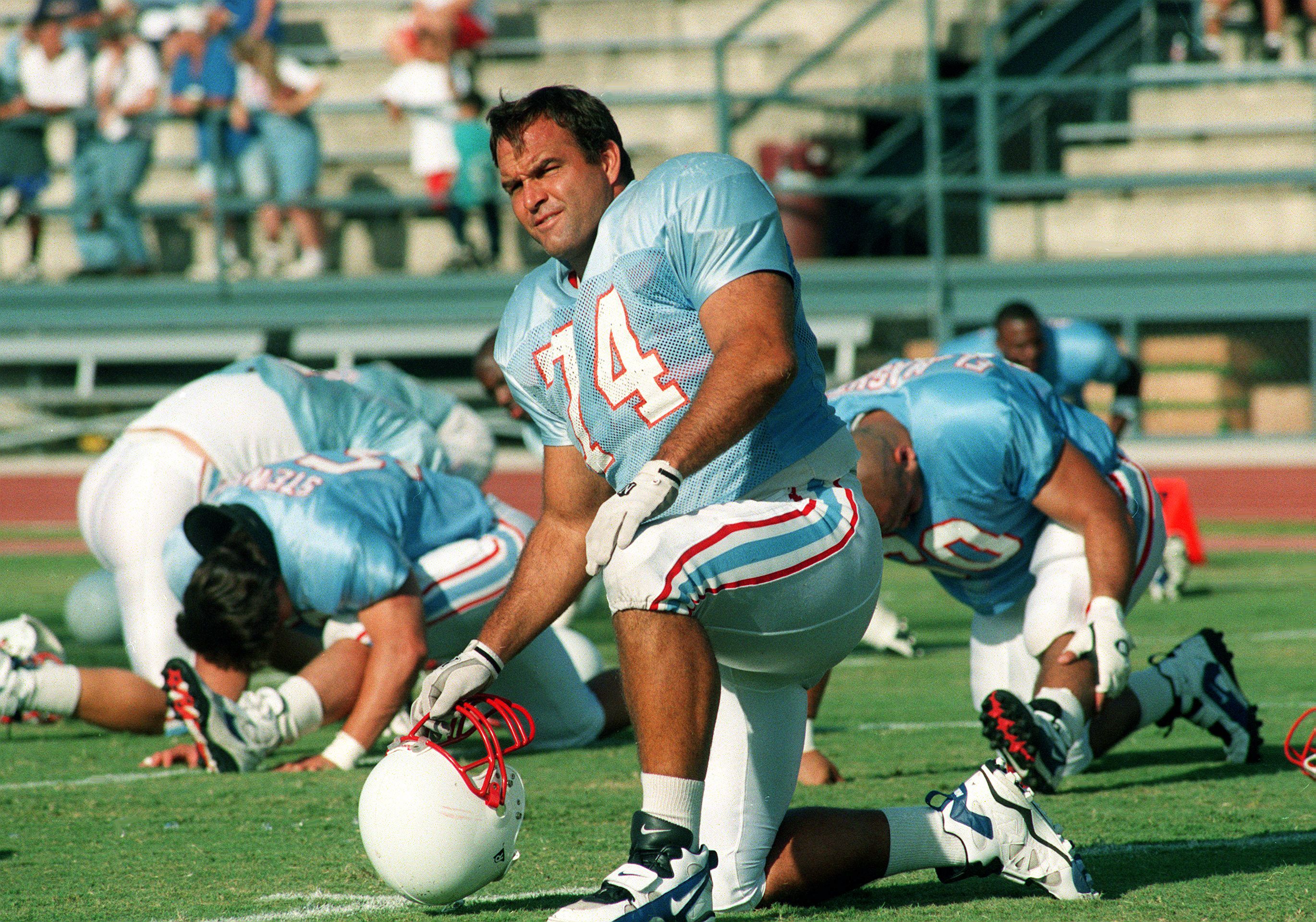 Houston Oilers offensive lineman Bruce Matthews (74) and other team members work out during training camp at Trinity College in San Antonio, Texas July 23, 1996. Bruce Matthews Tennessee Titan Ricky Rogers / The Tennessean-Nashville