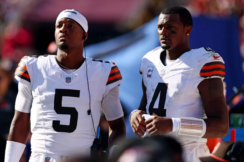 Cleveland Browns quarterback Deshaun Watson (4) and quarterback Jameis Winston (5) stand on the sideline during the fourth quarter of the game against the Washington Commanders at NorthWest Stadium.