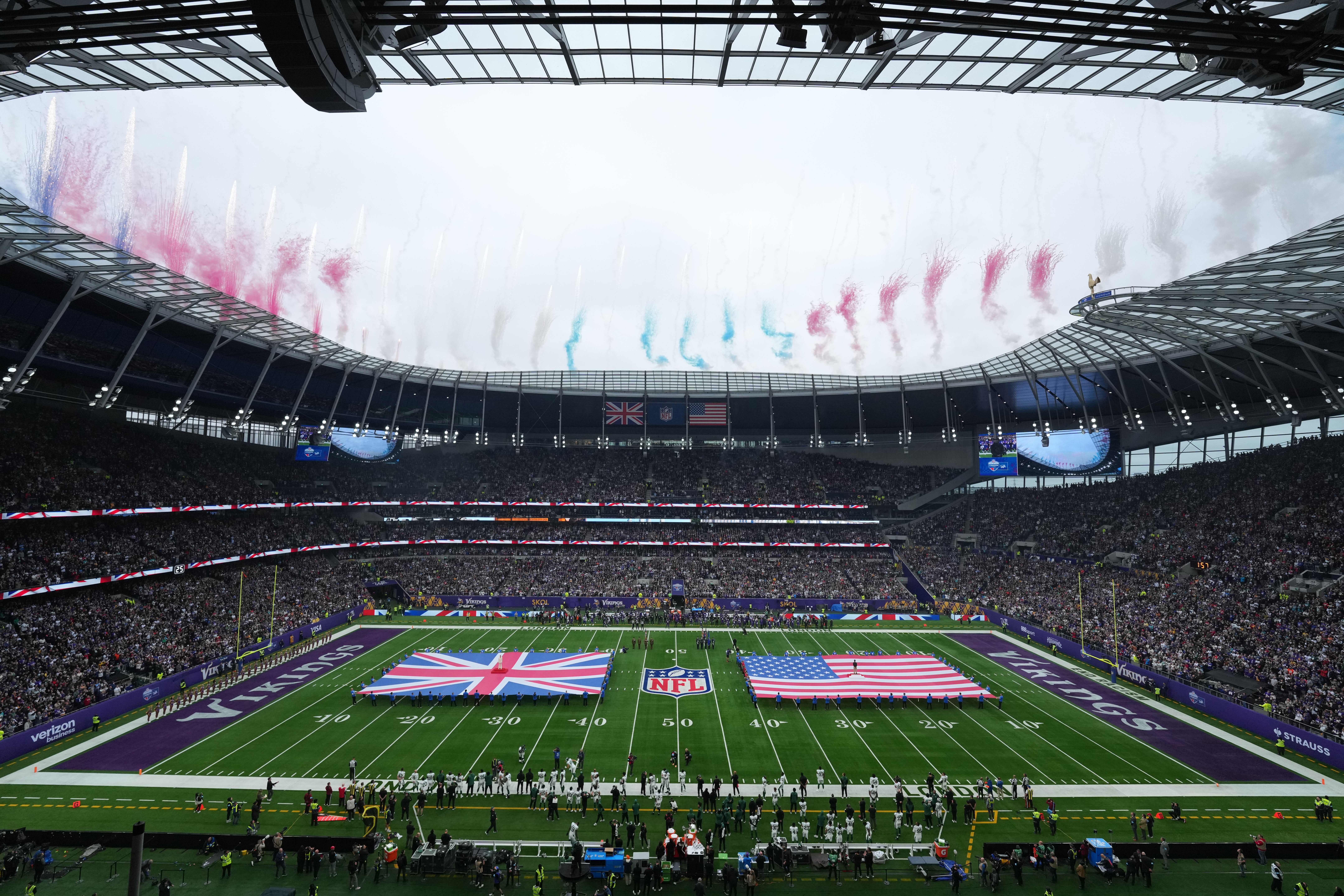 Oct 6, 2024; London, United Kingdom; A general view of the playing of the national anthem with United States and British flags on the field before the 2024 NFL London Game between the New York Jets and the Minnesota Vikings at Tottenham Hotspur Stadium.