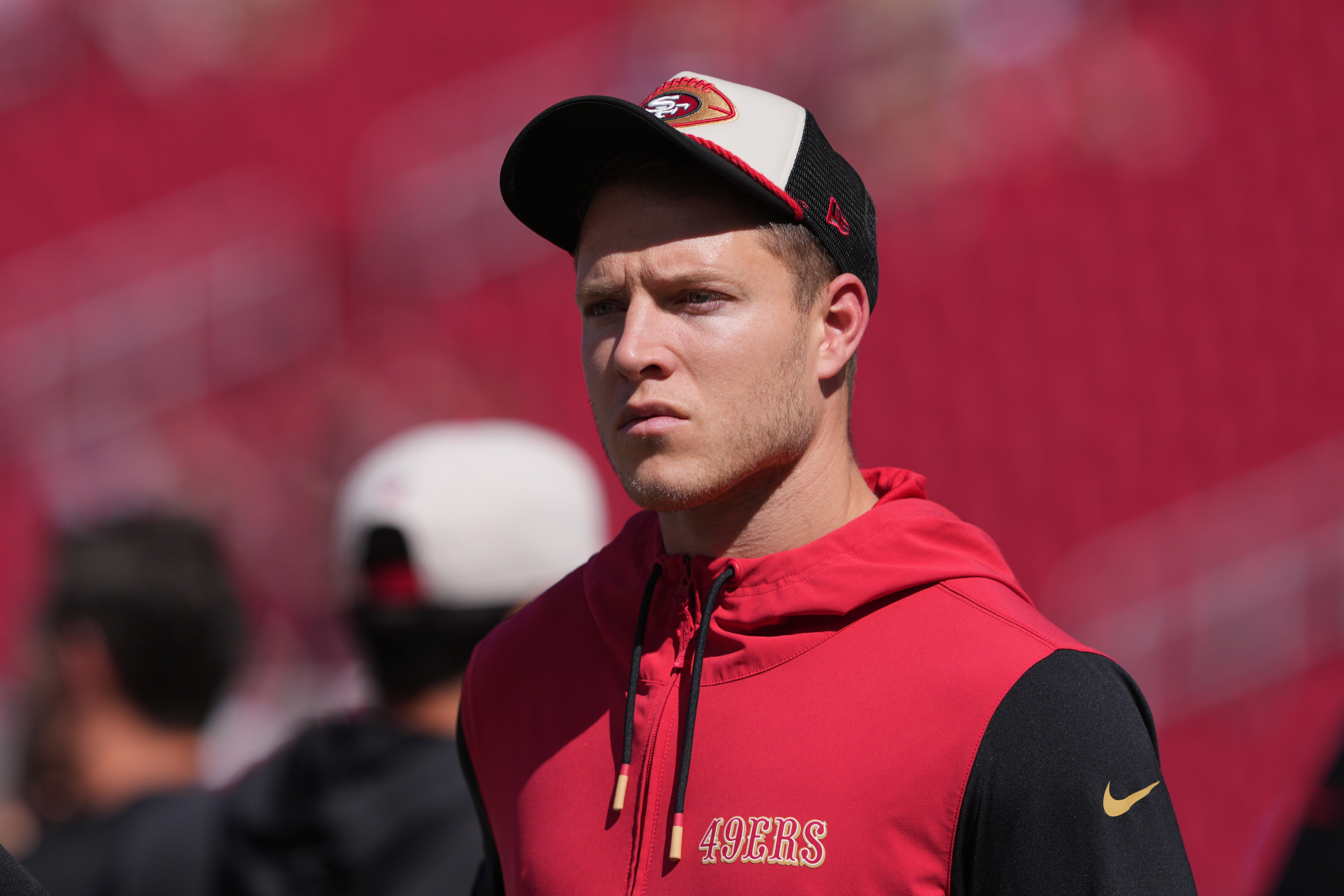 San Francisco 49ers running back Christian McCaffrey (23) walks on the field before the game against the Arizona Cardinals at Levi's Stadium.