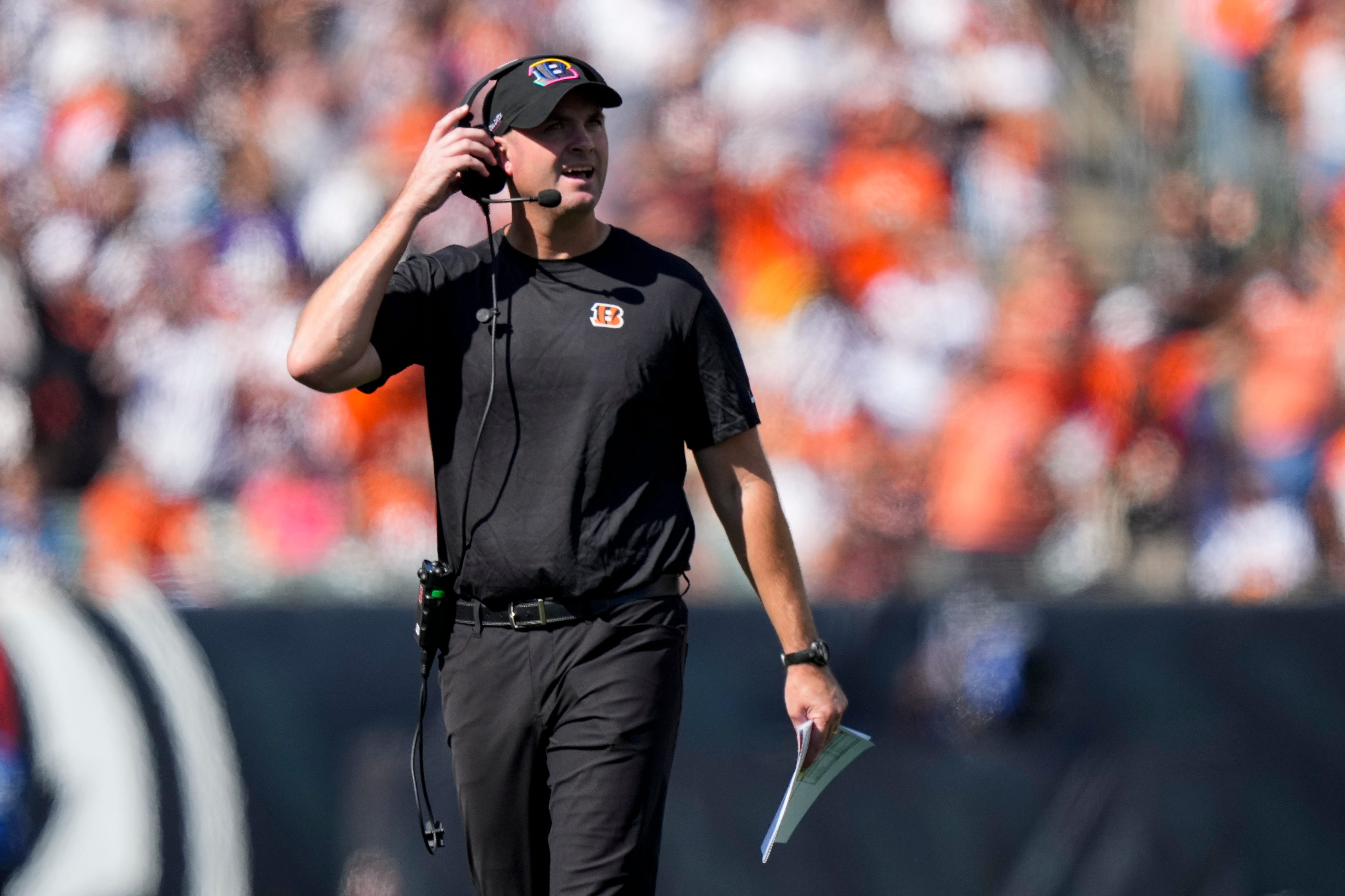 Cincinnati Bengals head coach Zac Taylor looks to the video board after a play in the second quarter of the NFL Week 5 game between the Cincinnati Bengals and Baltimore Ravens at Paycor Stadium in downtown Cincinnati on Sunday, Oct. 6, 2024. The Bengals led 17-14 at halftime.  