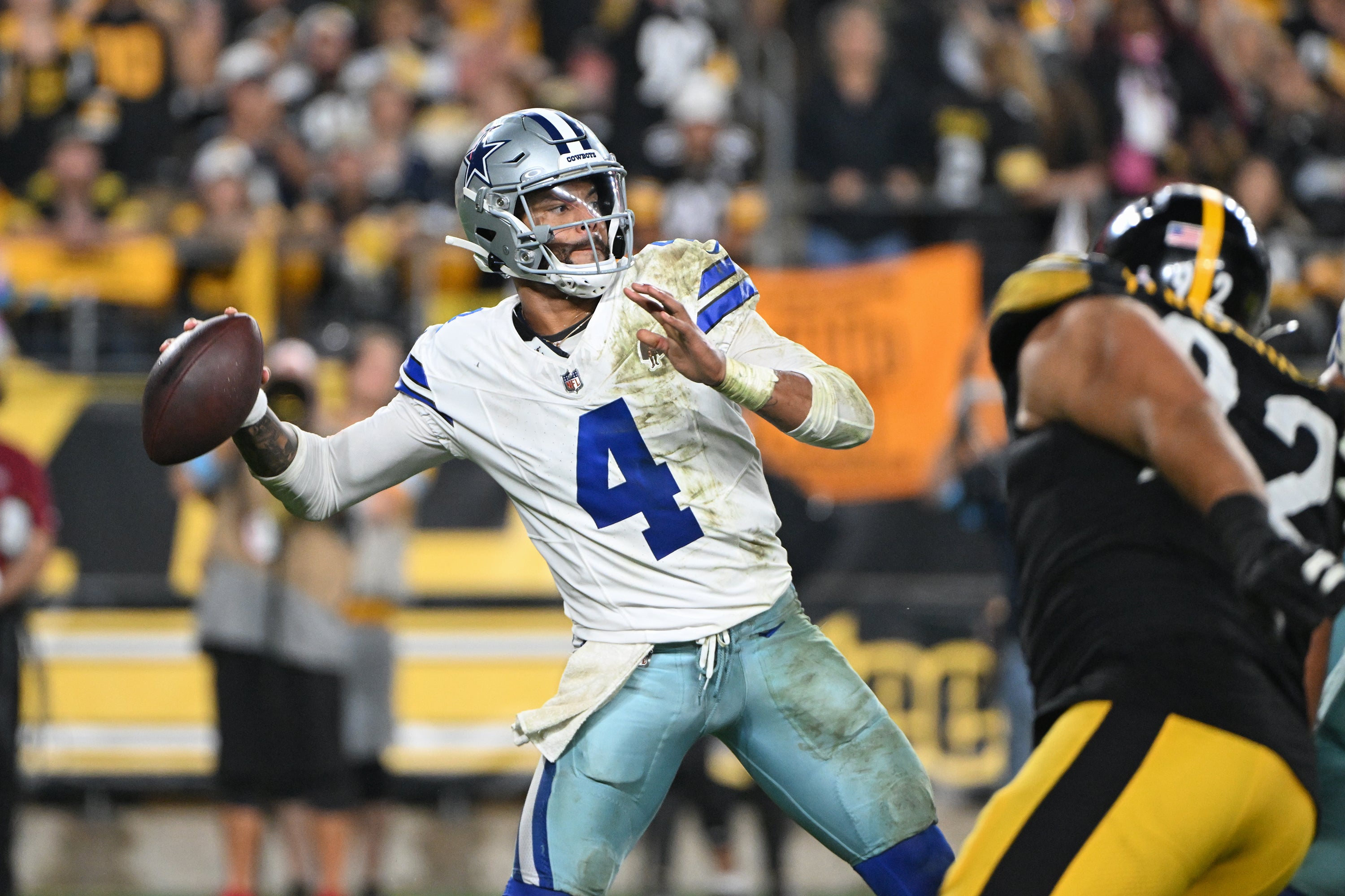 Dallas Cowboys quarterback Dak Prescott (4) throws a pass against the Pittsburgh Steelers during the fourth quarter at Acrisure Stadium.