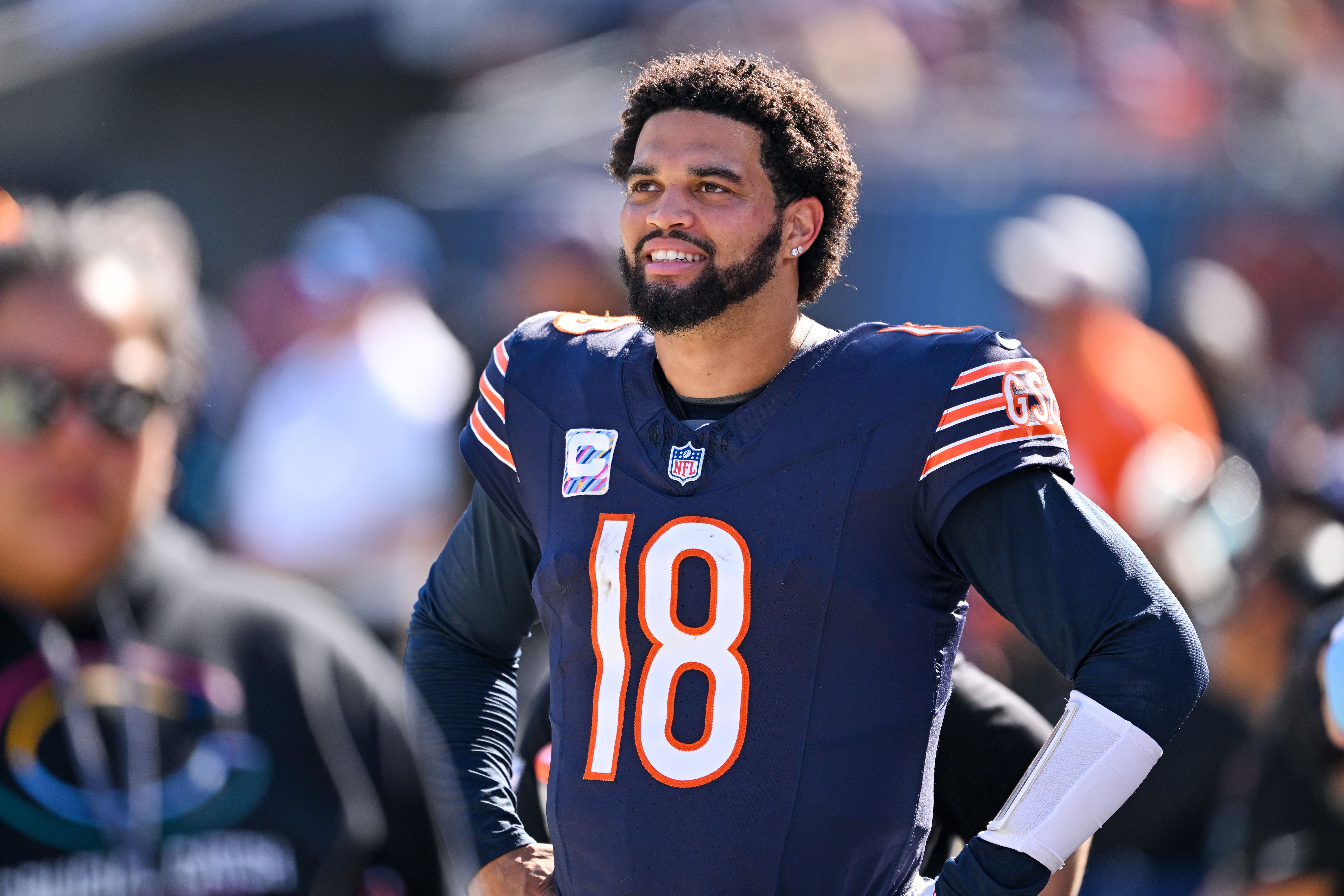 Oct 6, 2024; Chicago, Illinois, USA; Chicago Bears quarterback Caleb Williams (18) looks on from the sideline against the Carolina Panthers during the third quarter at Soldier Field.