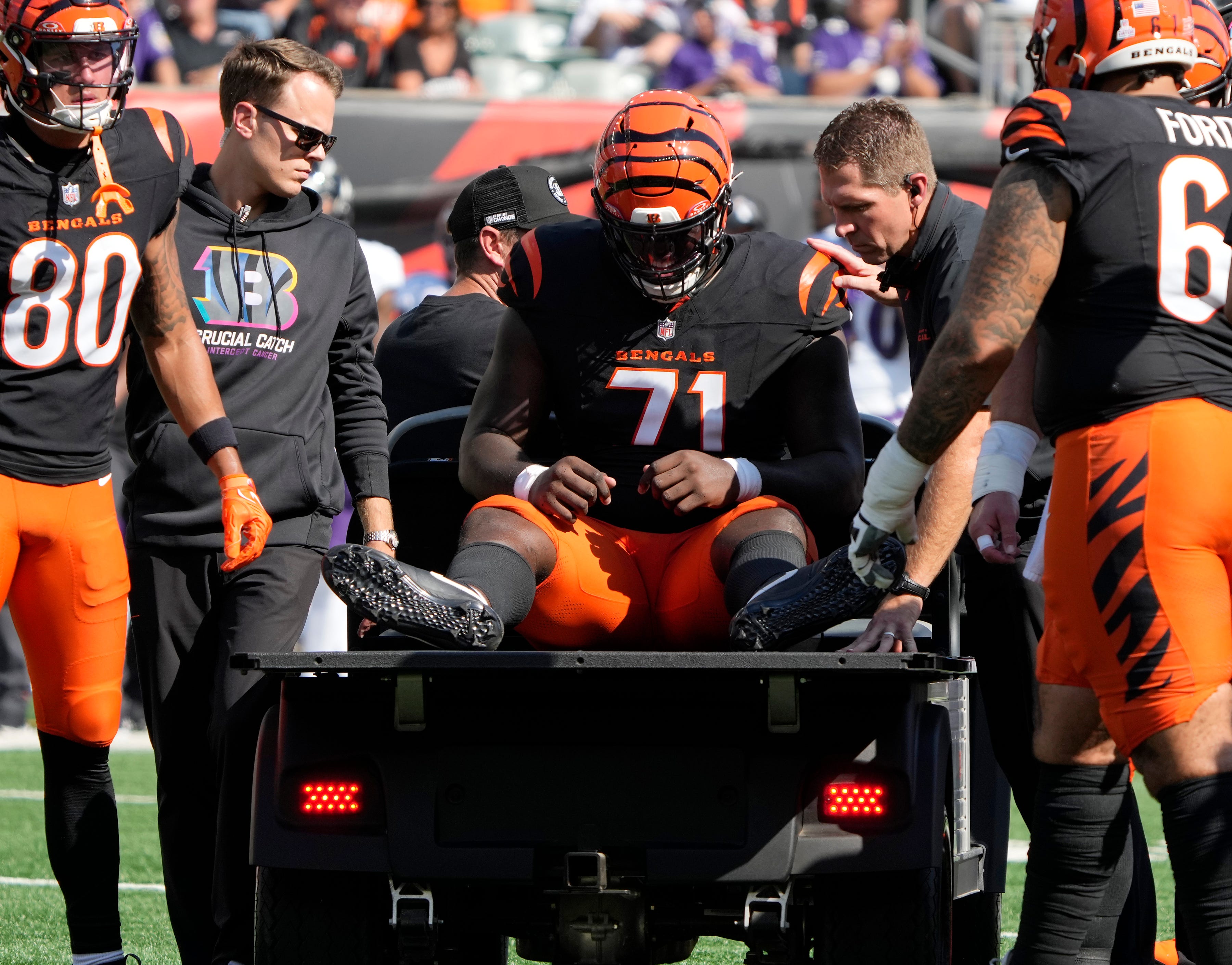 Cincinnati Bengals offensive tackle Amarius Mims (71) is carted off the field in the 3rd quarter against the Baltimore Ravens during NFL Week 5 Sunday October 6, 2024 at Payor Stadium.