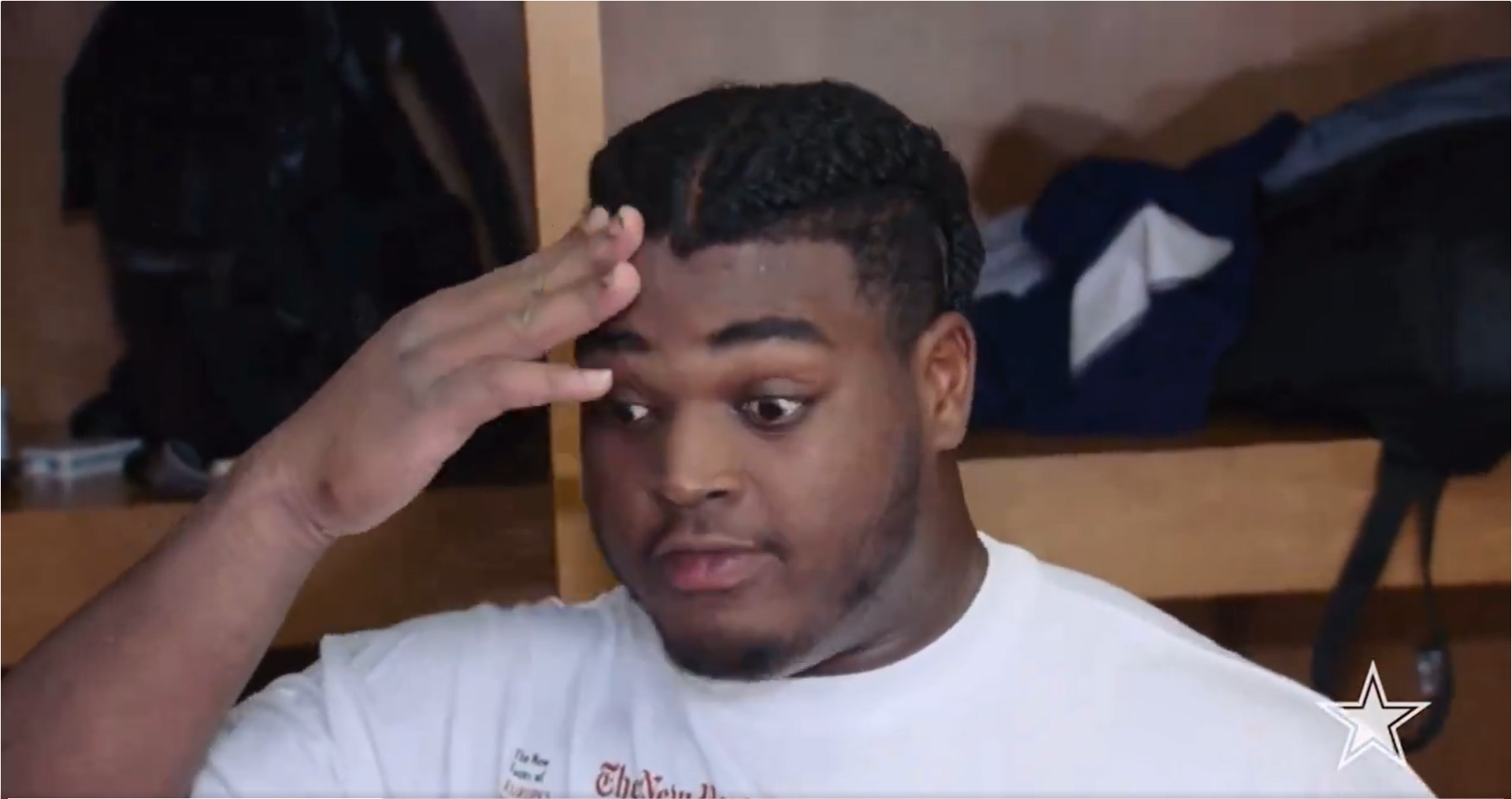 Dallas Cowboys LG Tyler Smith talks to reporters postgame after Steelers win.