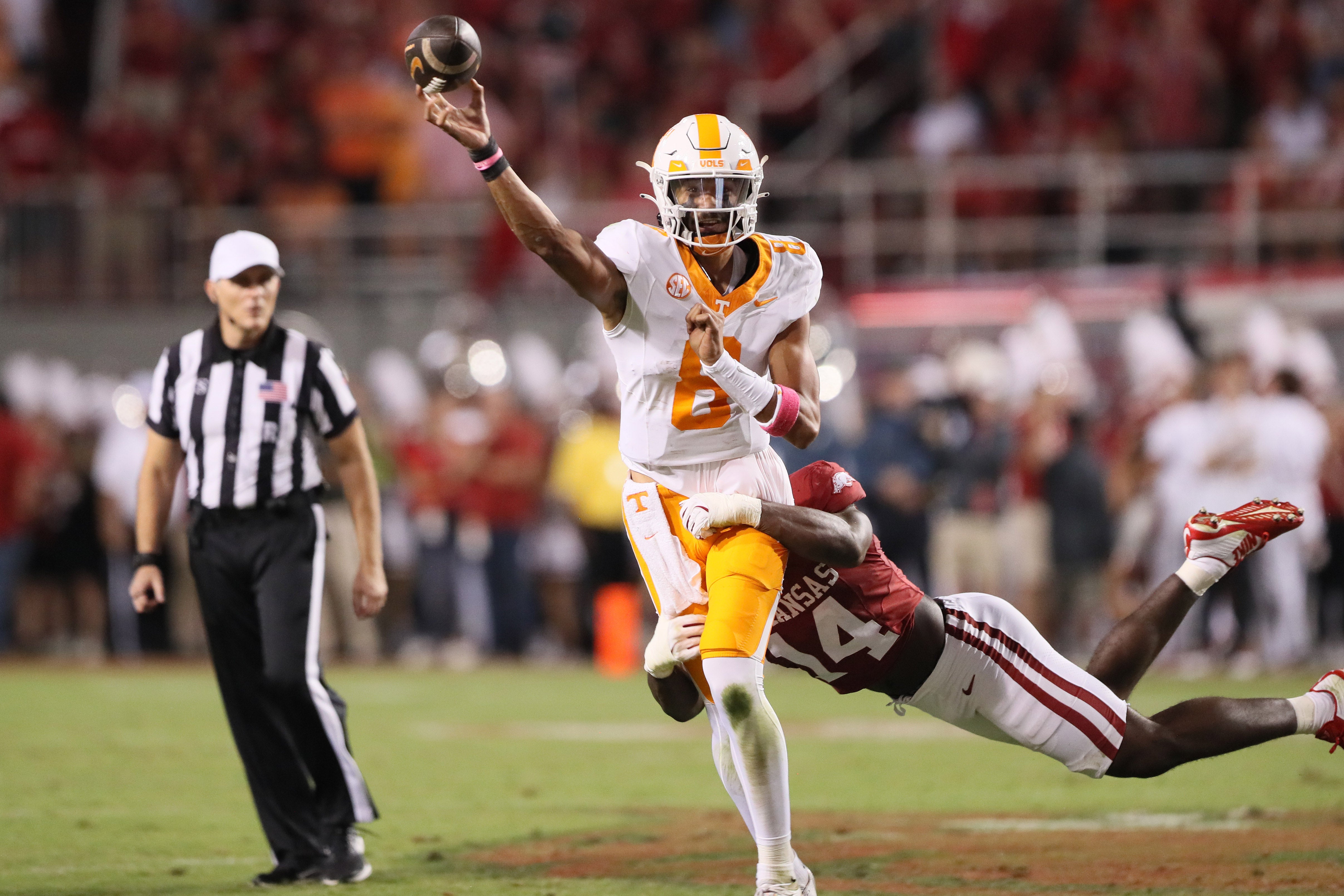 Oct 5, 2024; Fayetteville, Arkansas, USA; Tennessee Volunteers quarterback Nico Iamaleava (8) passes in the second quarter against the Arkansas Razorbacks at Donald W. Reynolds Razorback Stadium.