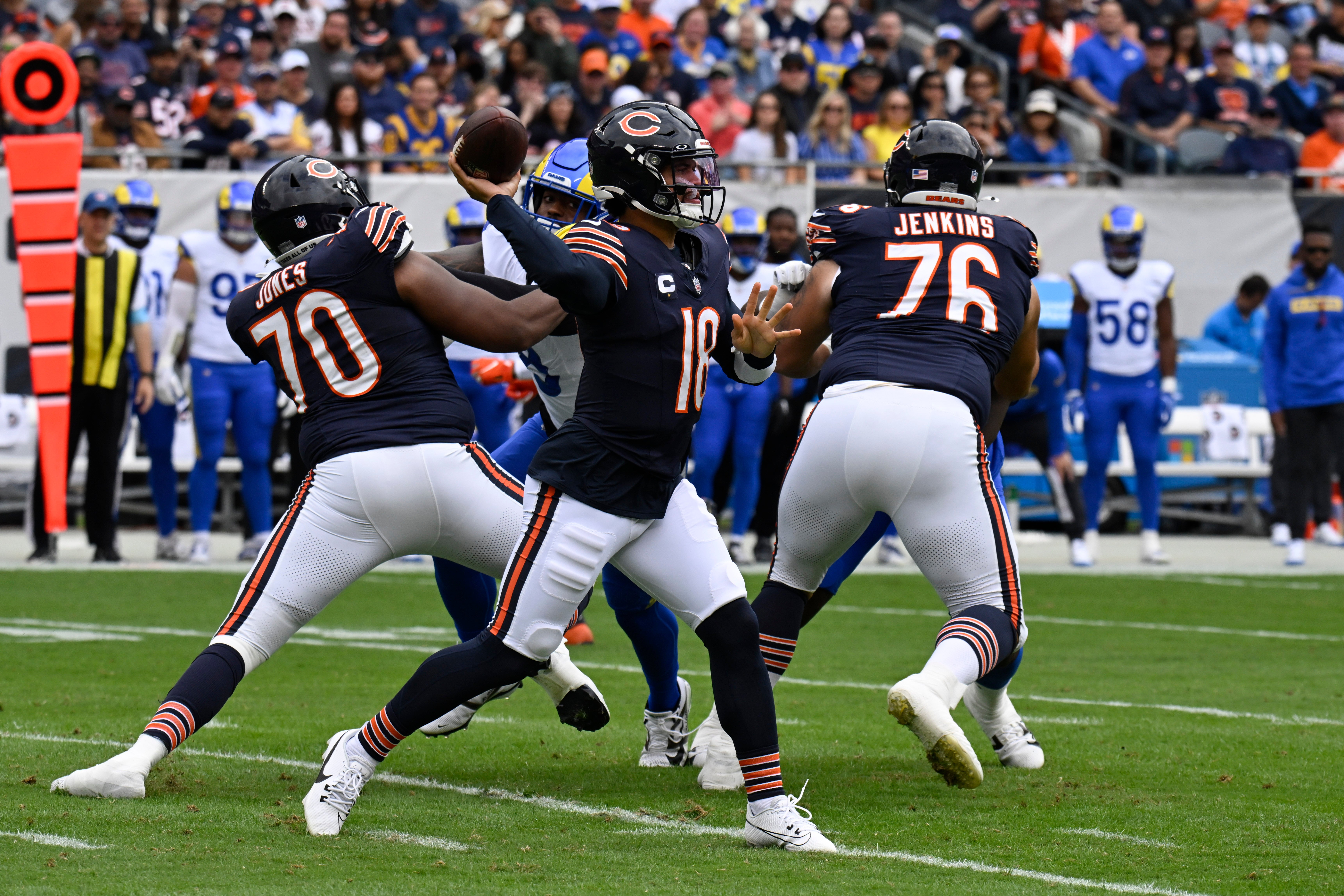 Sep 29, 2024; Chicago, Illinois, USA; Chicago Bears quarterback Caleb Williams (18) looks to throw the ball against the Los Angeles Rams during the first half at Soldier Field.