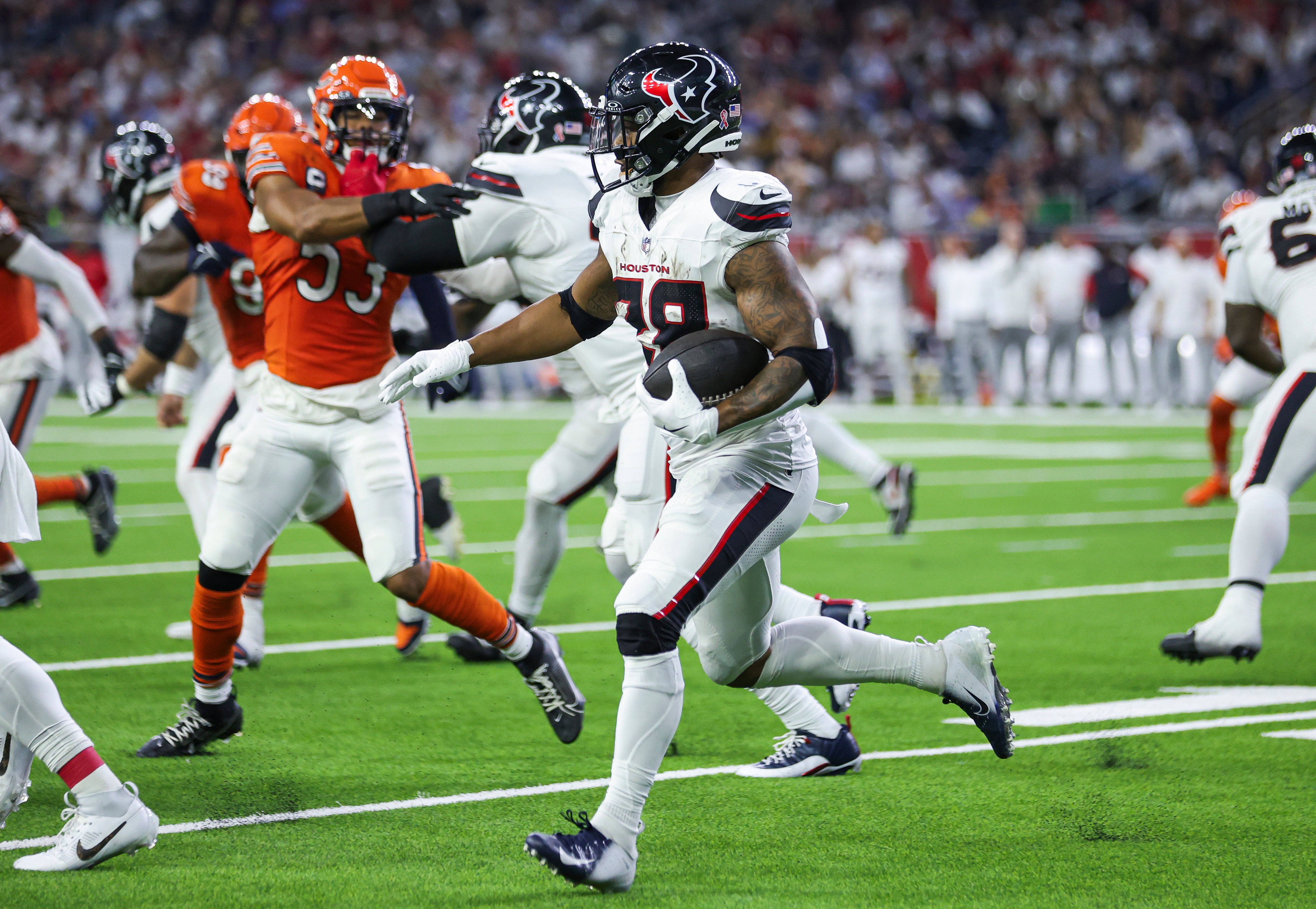 Sep 15, 2024; Houston, Texas, USA; Houston Texans running back Joe Mixon (28) runs with the ball during the third quarter against the Chicago Bears at NRG Stadium.