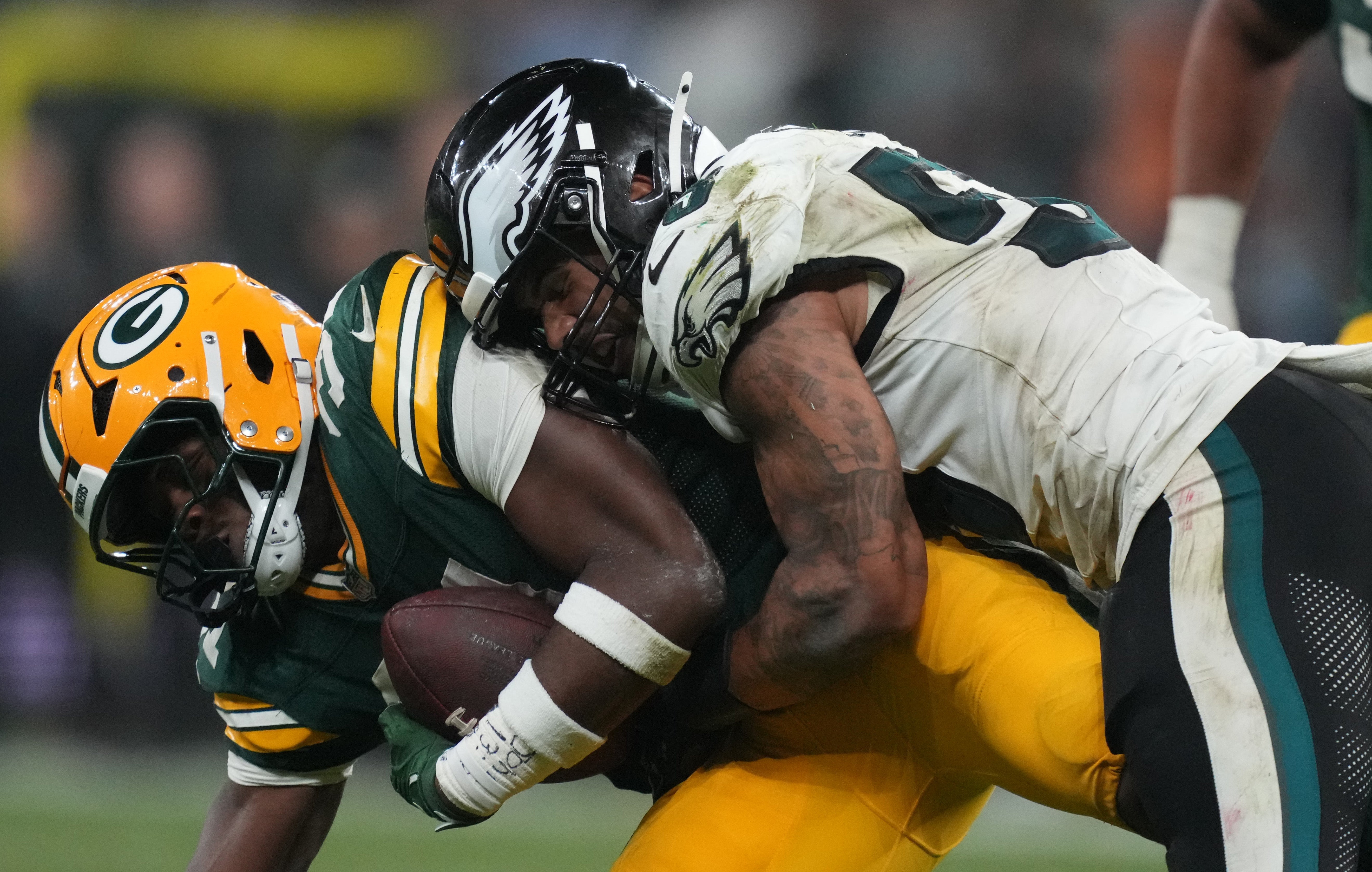 Philadelphia Eagles linebacker Zack Baun (53) tackles Green Bay Packers running back Emanuel Wilson (31) during the second half at Neo Quimica Arena.