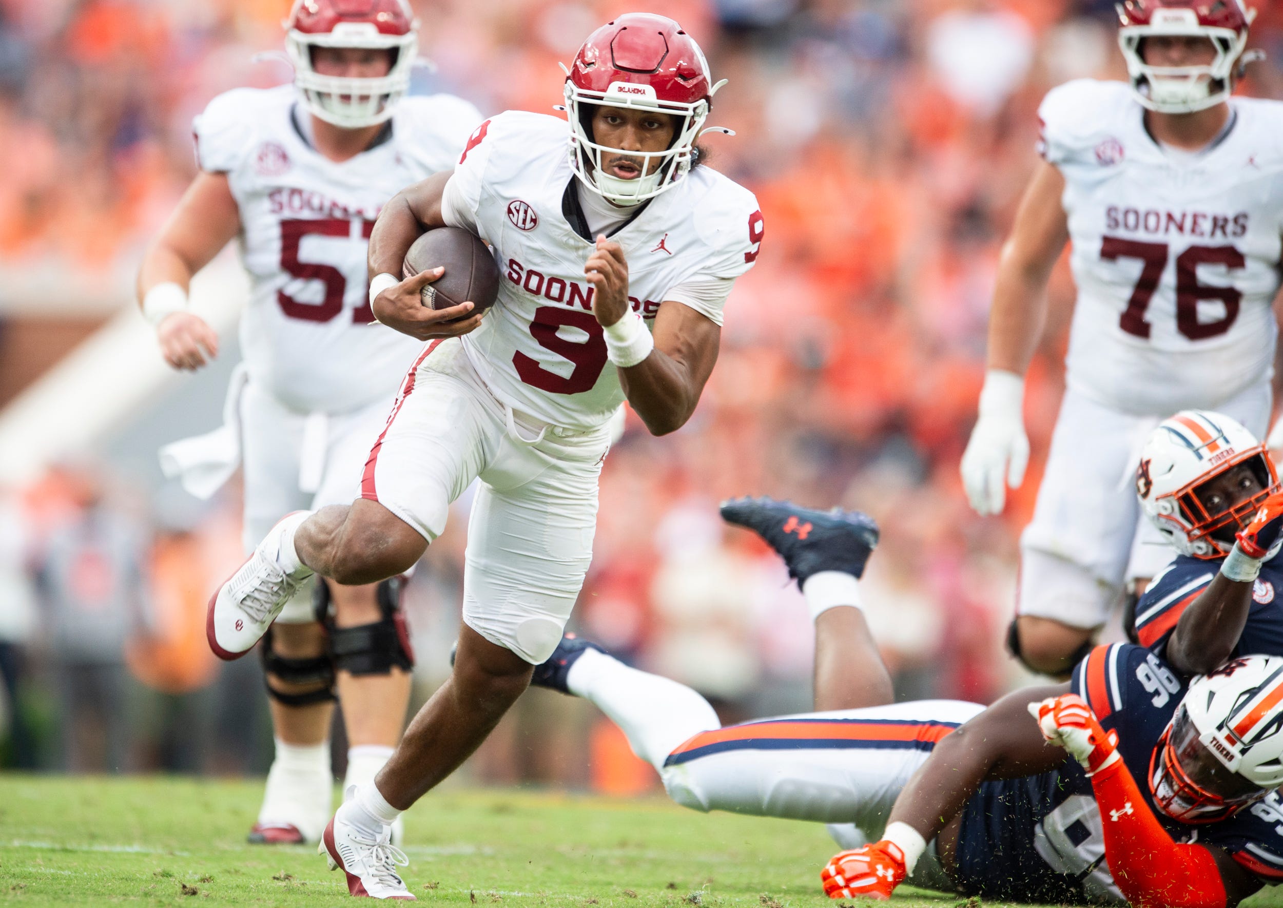 Oklahoma Sooners quarterback Michael Hawkins Jr. (9) runs the ball as Auburn Tigers take on Oklahoma Sooners at Jordan-Hare Stadium in Auburn, Ala., on Saturday, Sept. 28, 2024. Oklahoma Sooners defeated Auburn Tigers 27-21.
