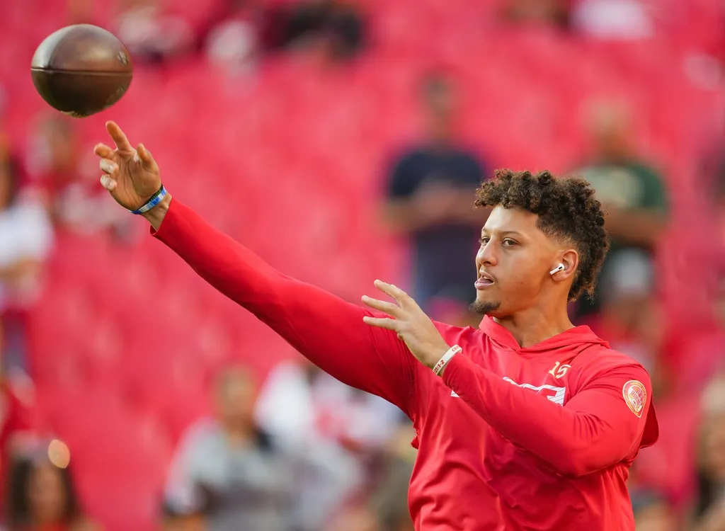 Kansas City Chiefs quarterback Patrick Mahomes (15) warms up prior to a game against the New Orleans Saints at GEHA Field at Arrowhead Stadium.