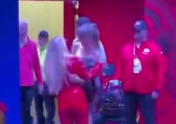 Brittany Mahomes runs over to hug Taylor Swift at Arrowhead Stadium.