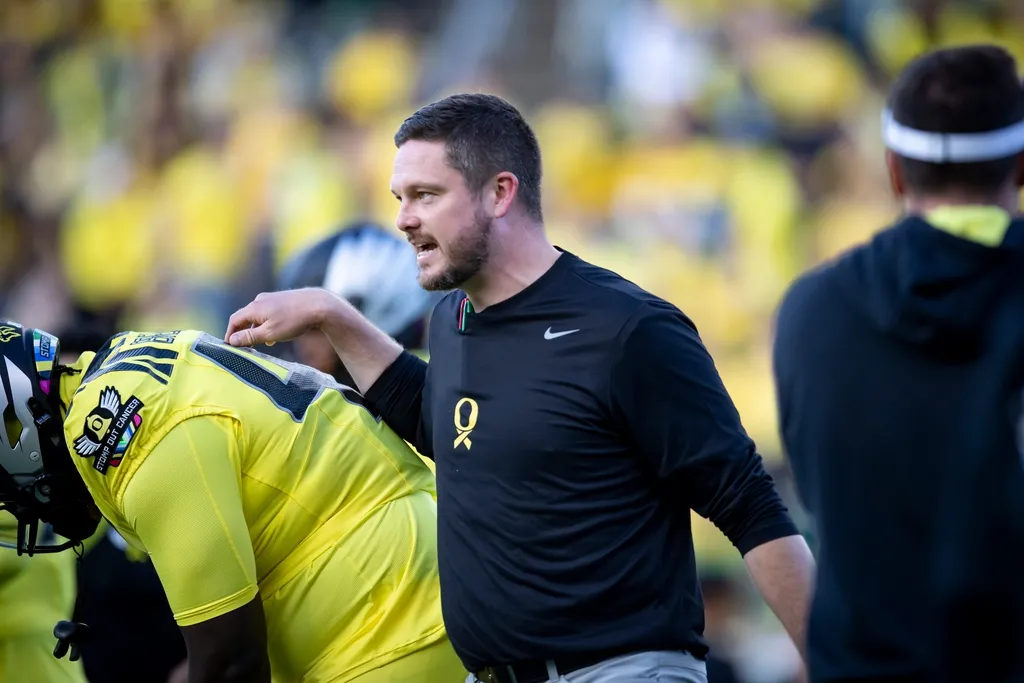 Oregon Ducks head coach Dan Lanning walks the field during warmups as the Ducks host the Spartans Friday, Oct. 4, 2024 at Autzen Stadium in Eugene, Ore