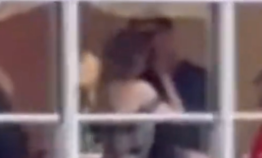 Travis Kelce and Taylor Swift kiss after the Kansas City Chiefs defeat the New Orleans Saints on Monday Night Football