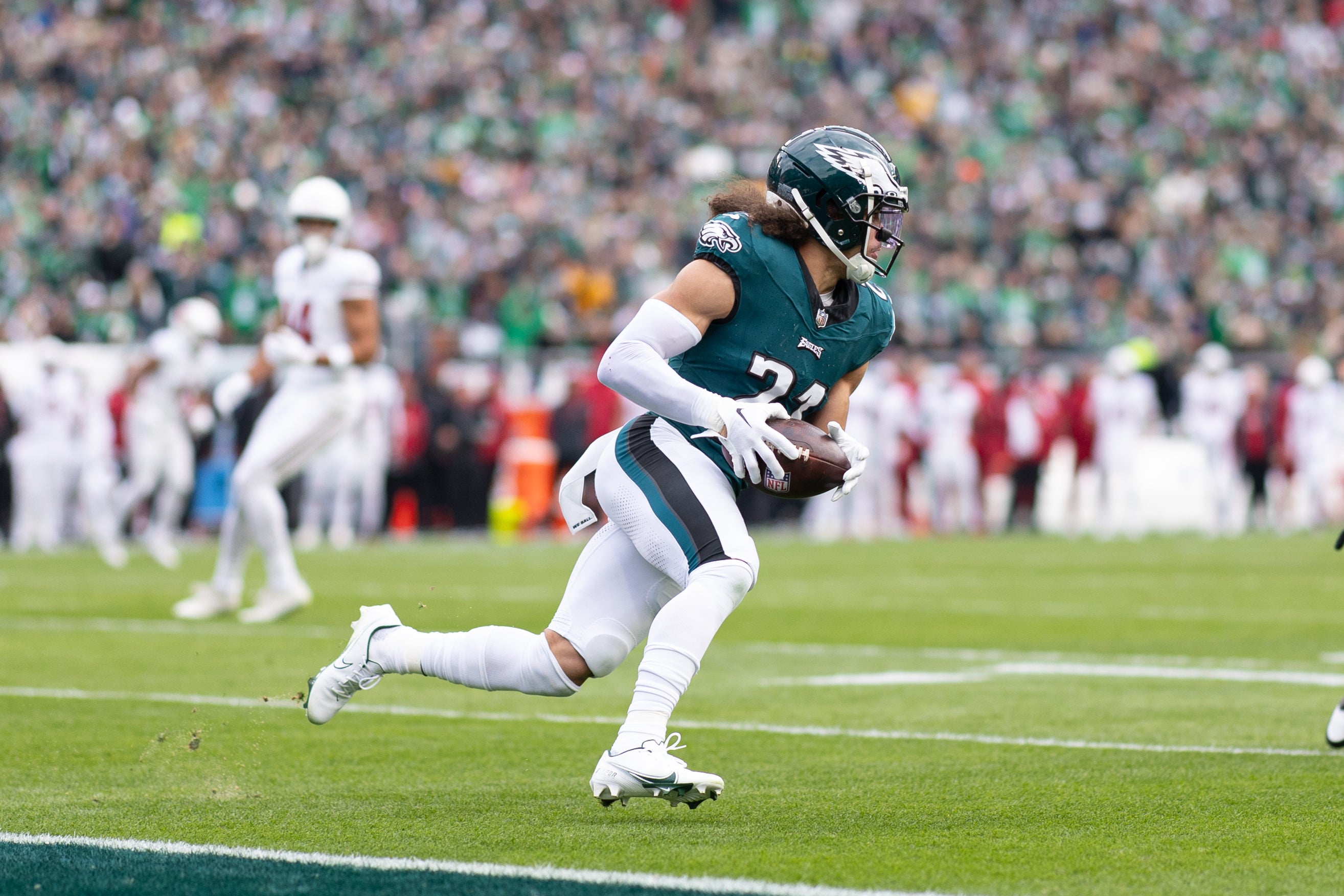 Philadelphia Eagles safety Sydney Brown (21) intercepts a pass and returns for a 99 yard touchdown against the Arizona Cardinals during the second quarter at Lincoln Financial Field.