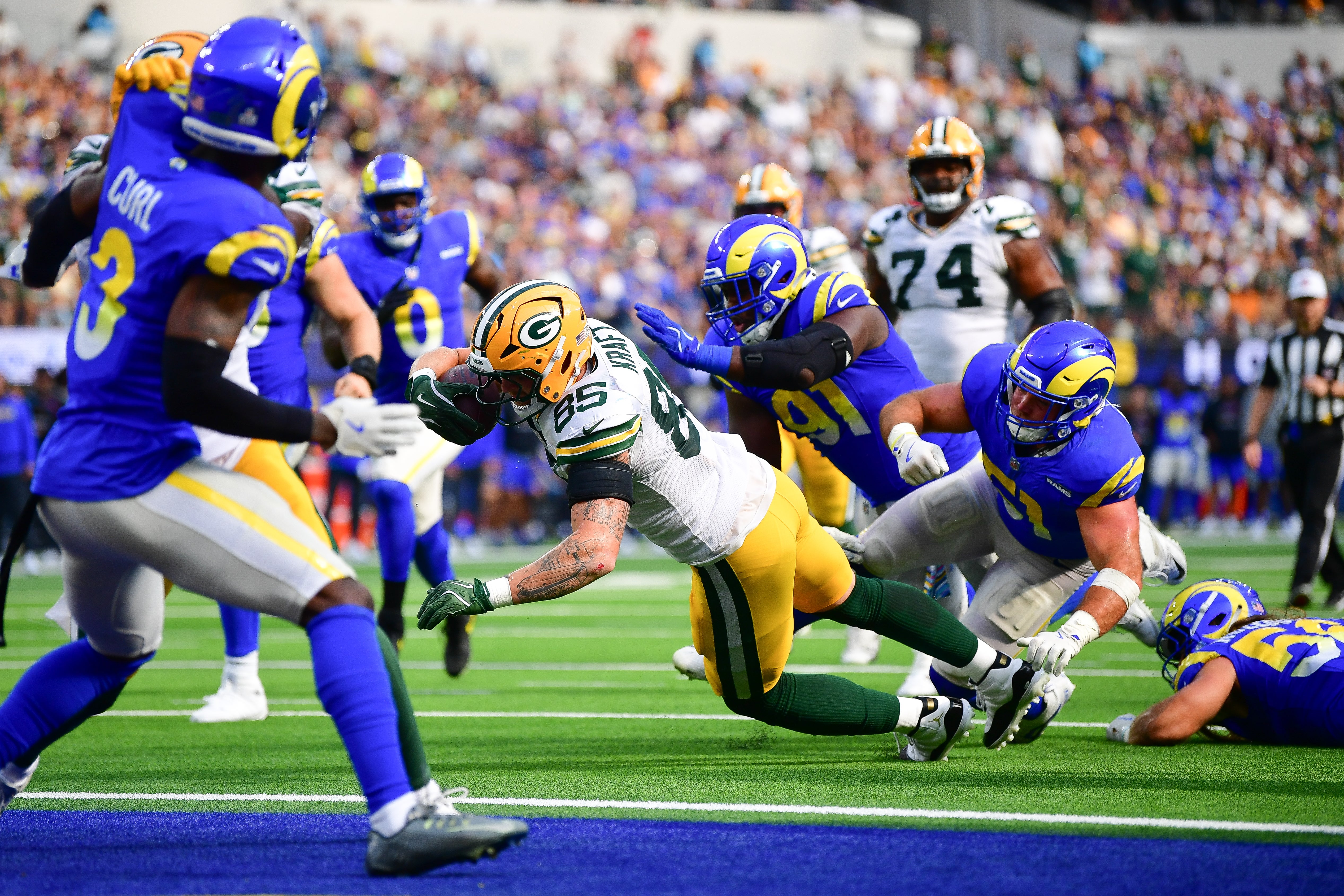 Green Bay Packers tight end Tucker Kraft (85) is stopped short of the goal line against the Los Angeles Rams during the second half at SoFi Stadium.