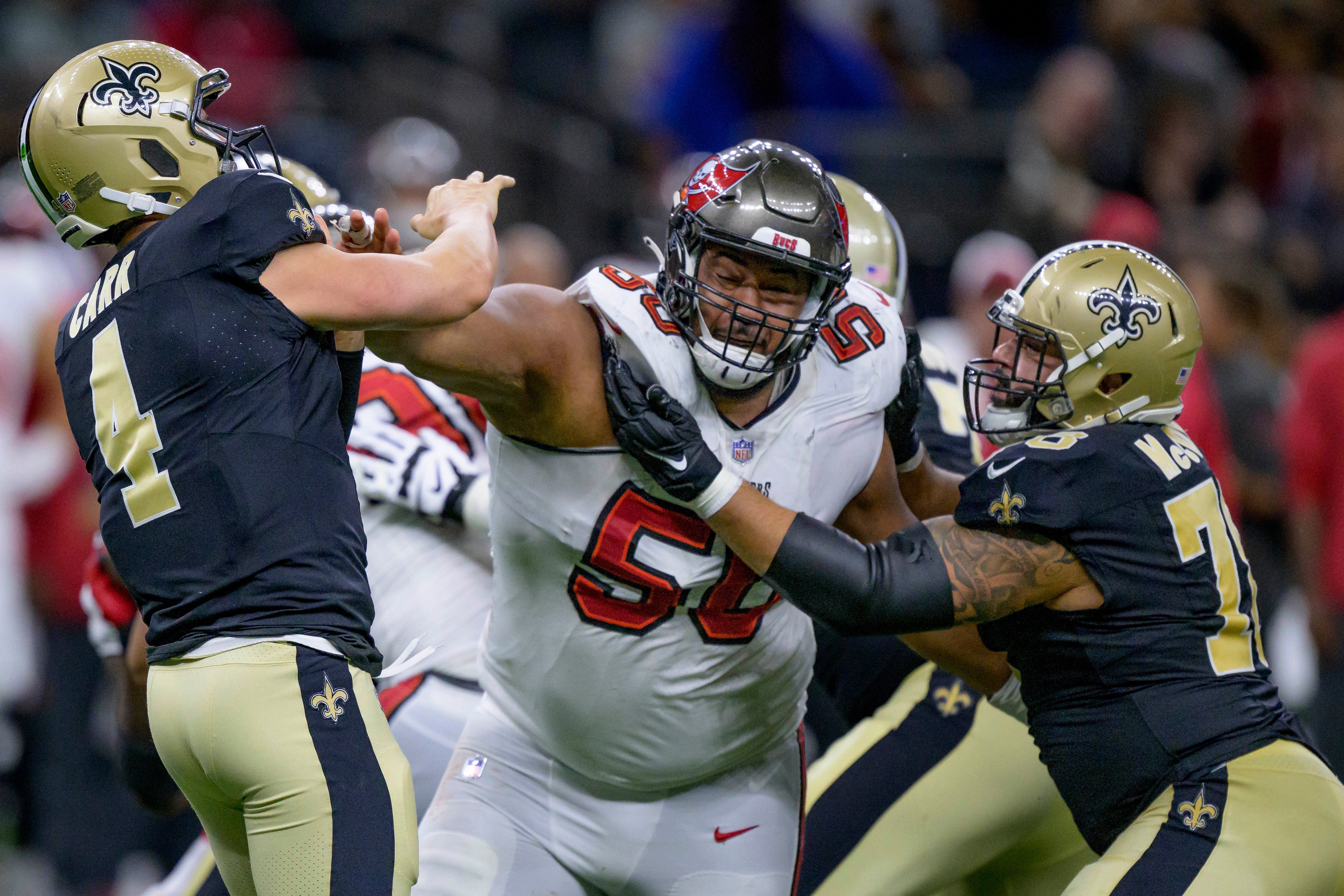 Oct 1, 2023; New Orleans, Louisiana, USA; Tampa Bay Buccaneers defensive tackle Vita Vea (50) pressures New Orleans Saints quarterback Derek Carr (4) while being defended by New Orleans Saints center Erik McCoy (78) during the fourth quarter at the Caesars Superdome.