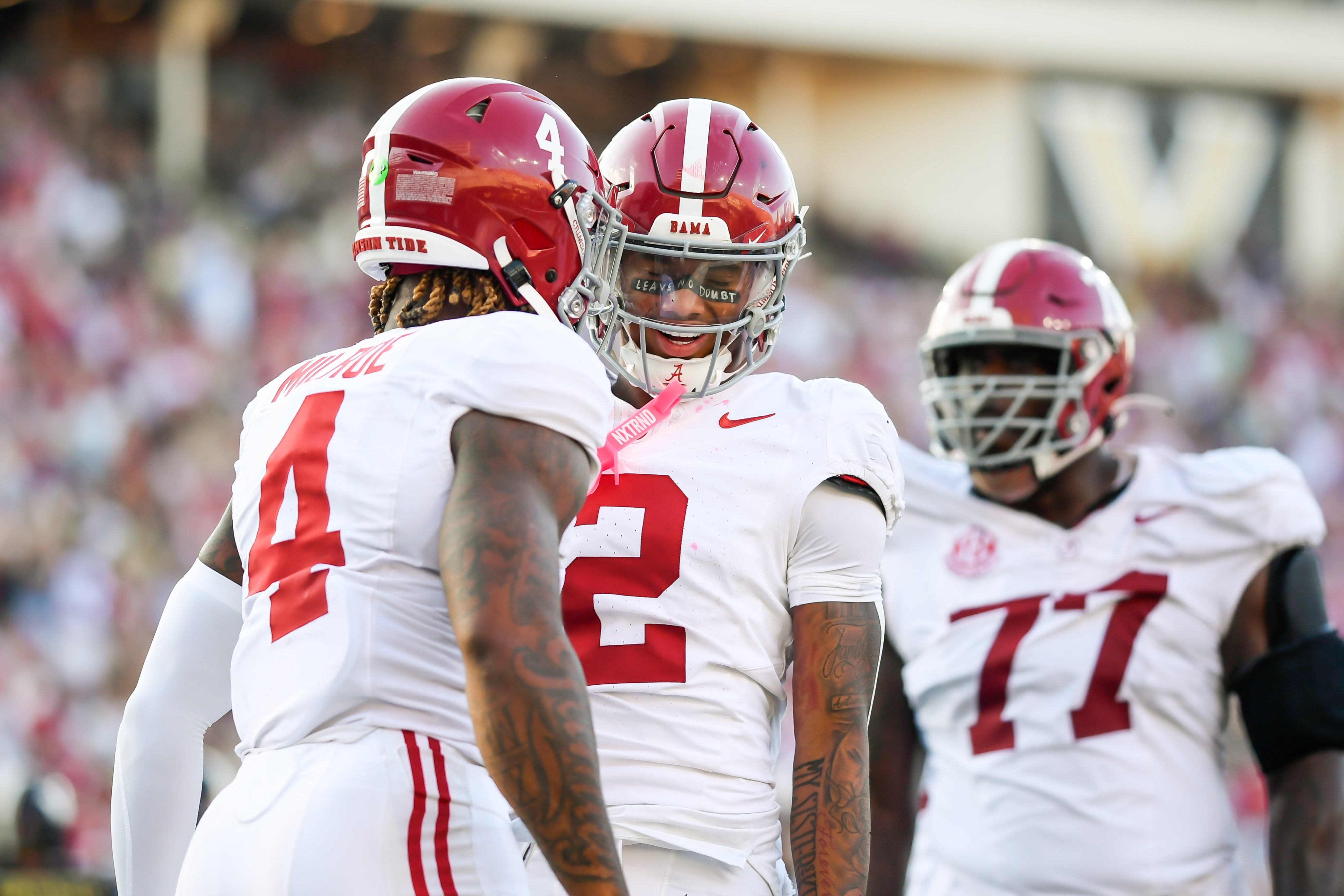 Oct 5, 2024; Nashville, Tennessee, USA; Alabama Crimson Tide quarterback Jalen Milroe (4) and wide receiver Ryan Williams (2) celebrate the touchdown during the second half at FirstBank Stadium.