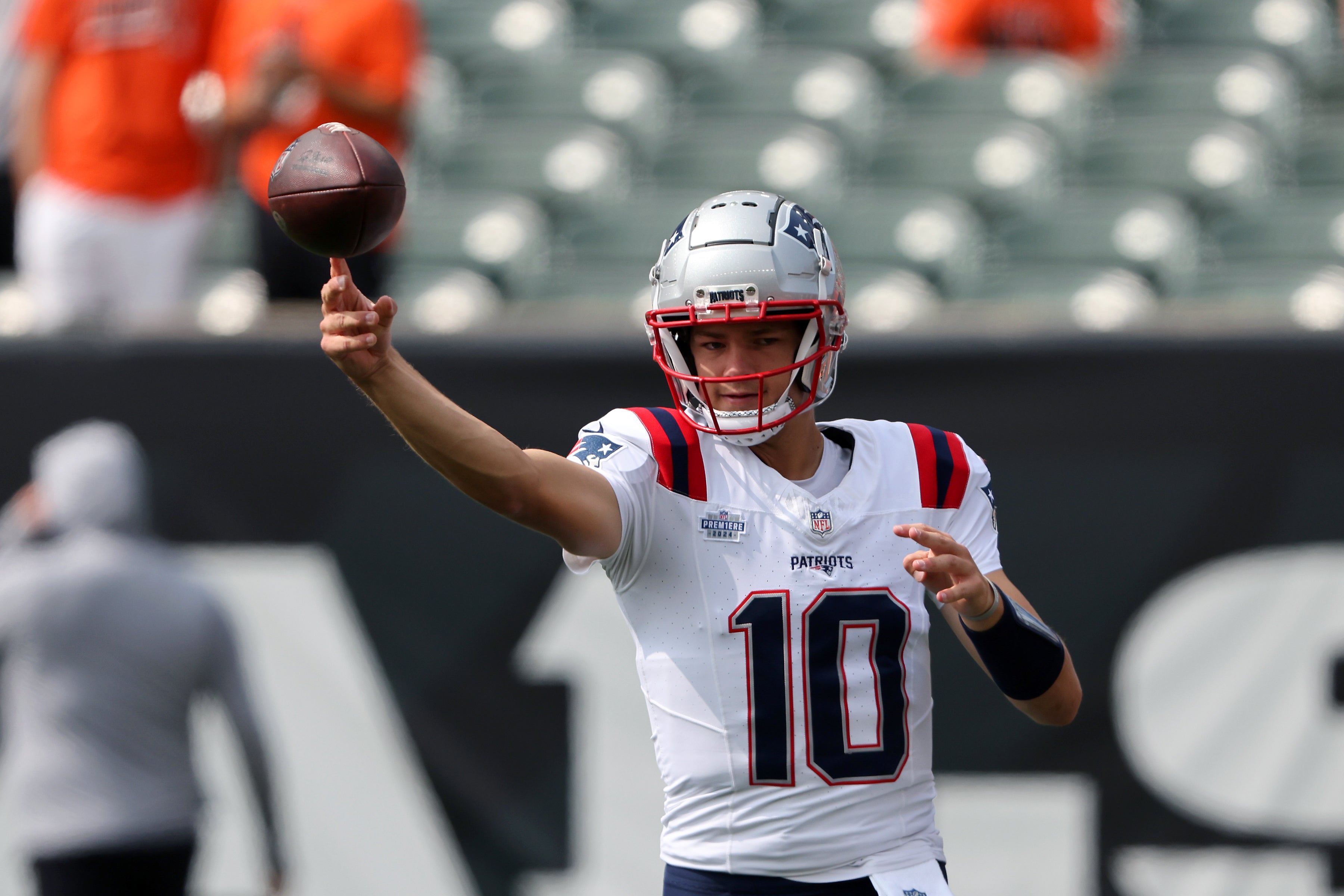 Sep 8, 2024; Cincinnati, Ohio, USA; New England Patriots quarterback Drake Maye (10) warms up before the game against the Cincinnati Bengals at Paycor Stadium.