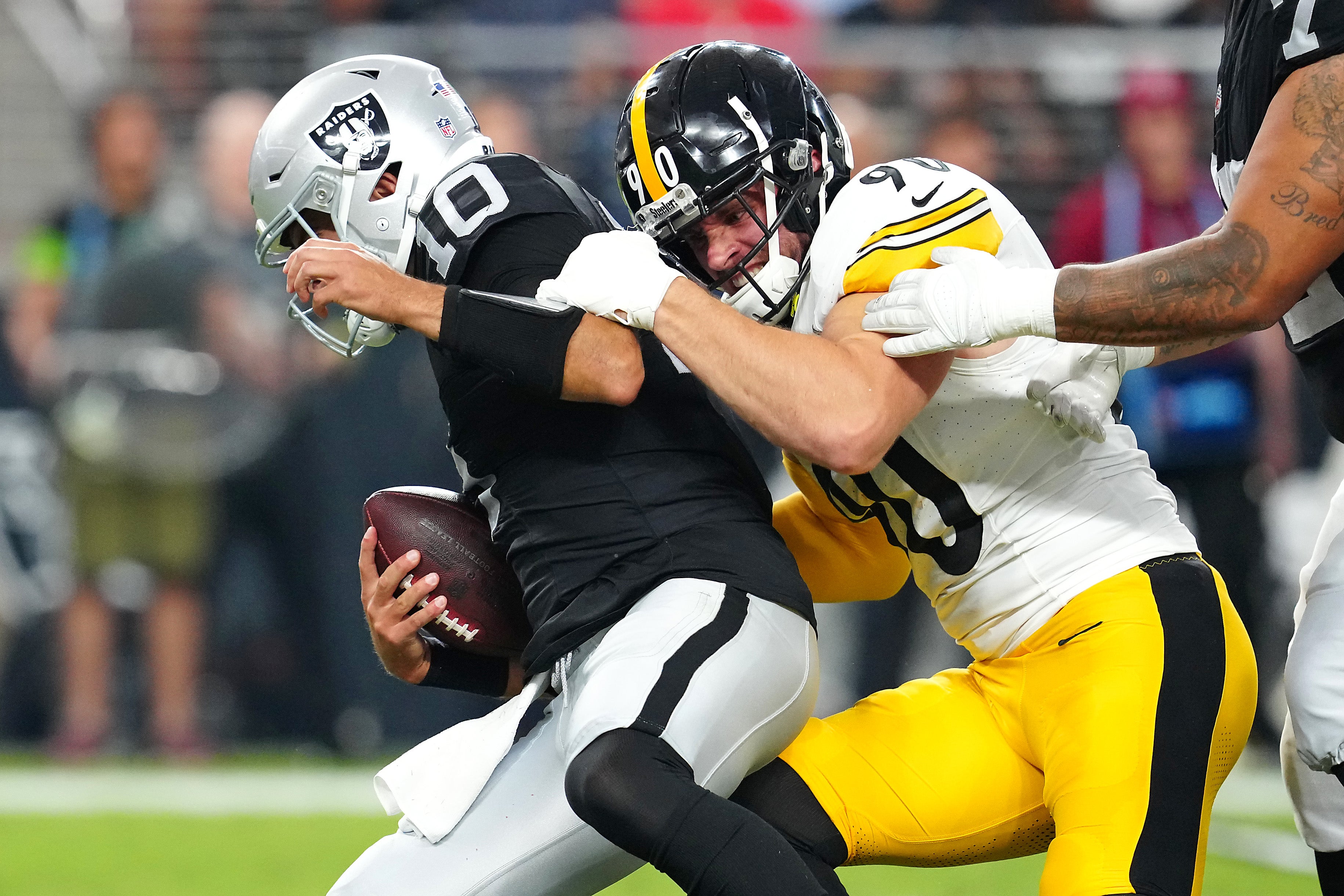 Sep 24, 2023; Paradise, Nevada, USA; Pittsburgh Steelers linebacker T.J. Watt (90) sacks Las Vegas Raiders quarterback Jimmy Garoppolo (10) during the first quarter at Allegiant Stadium.